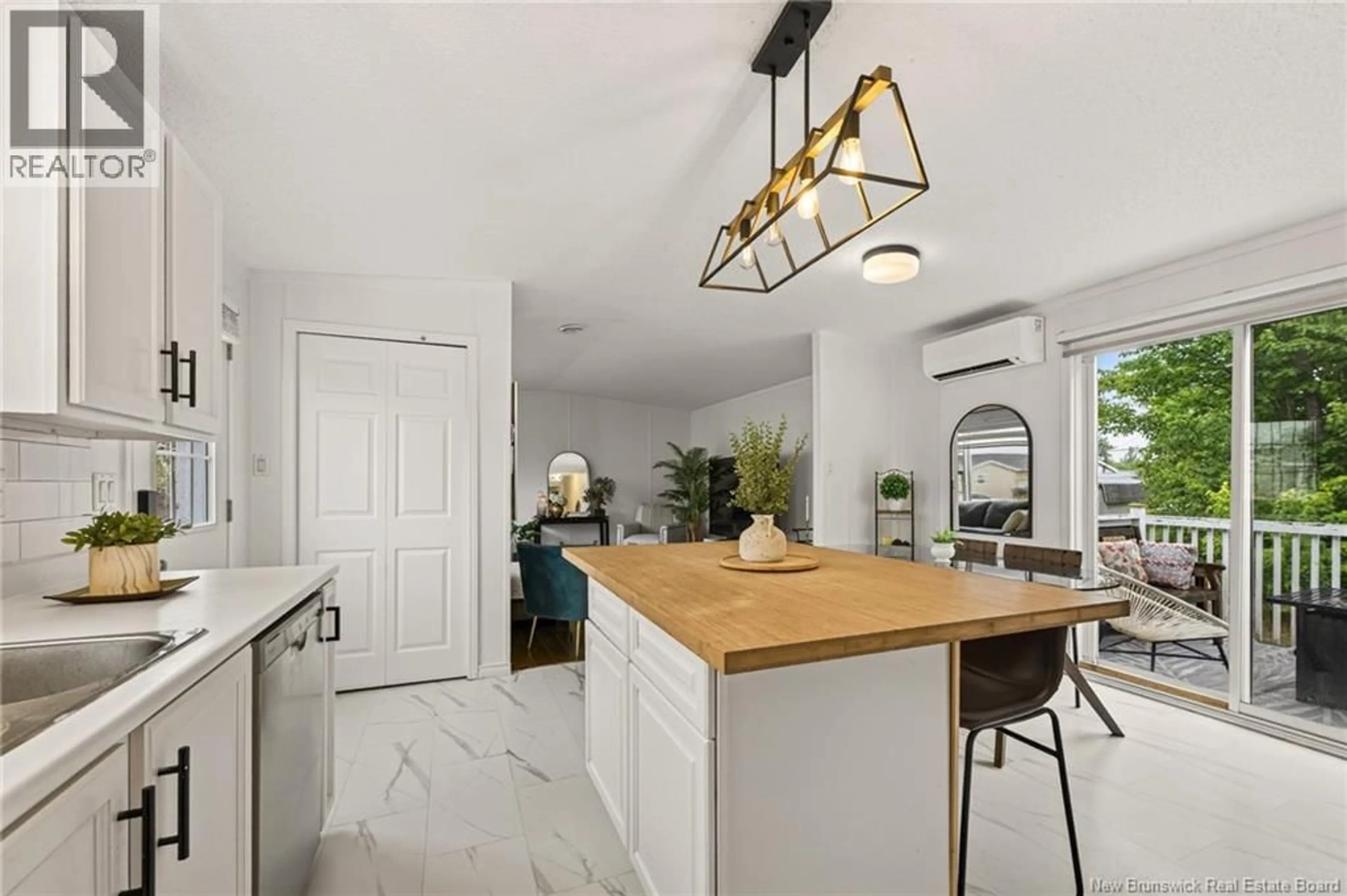 Open concept kitchen, ceramic/tile floor for 82 TRACADIE, Dieppe New Brunswick E1A8P2