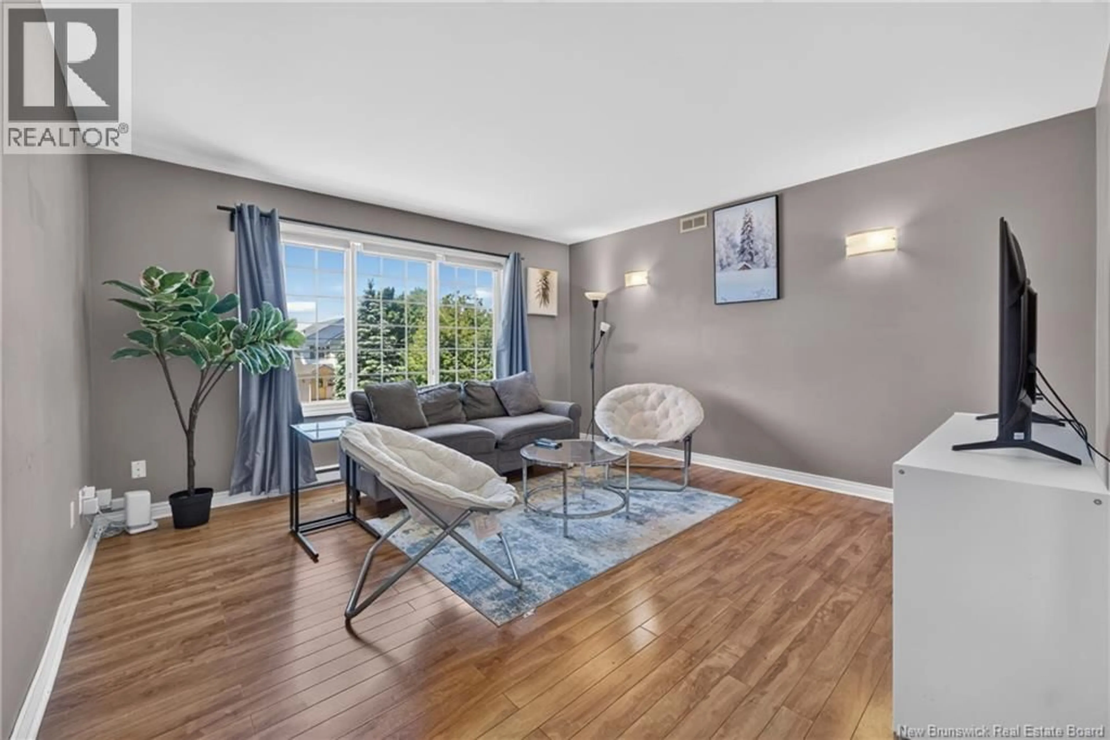 Living room with furniture, unknown for 103 THOMAS, Dieppe New Brunswick E1A5W2
