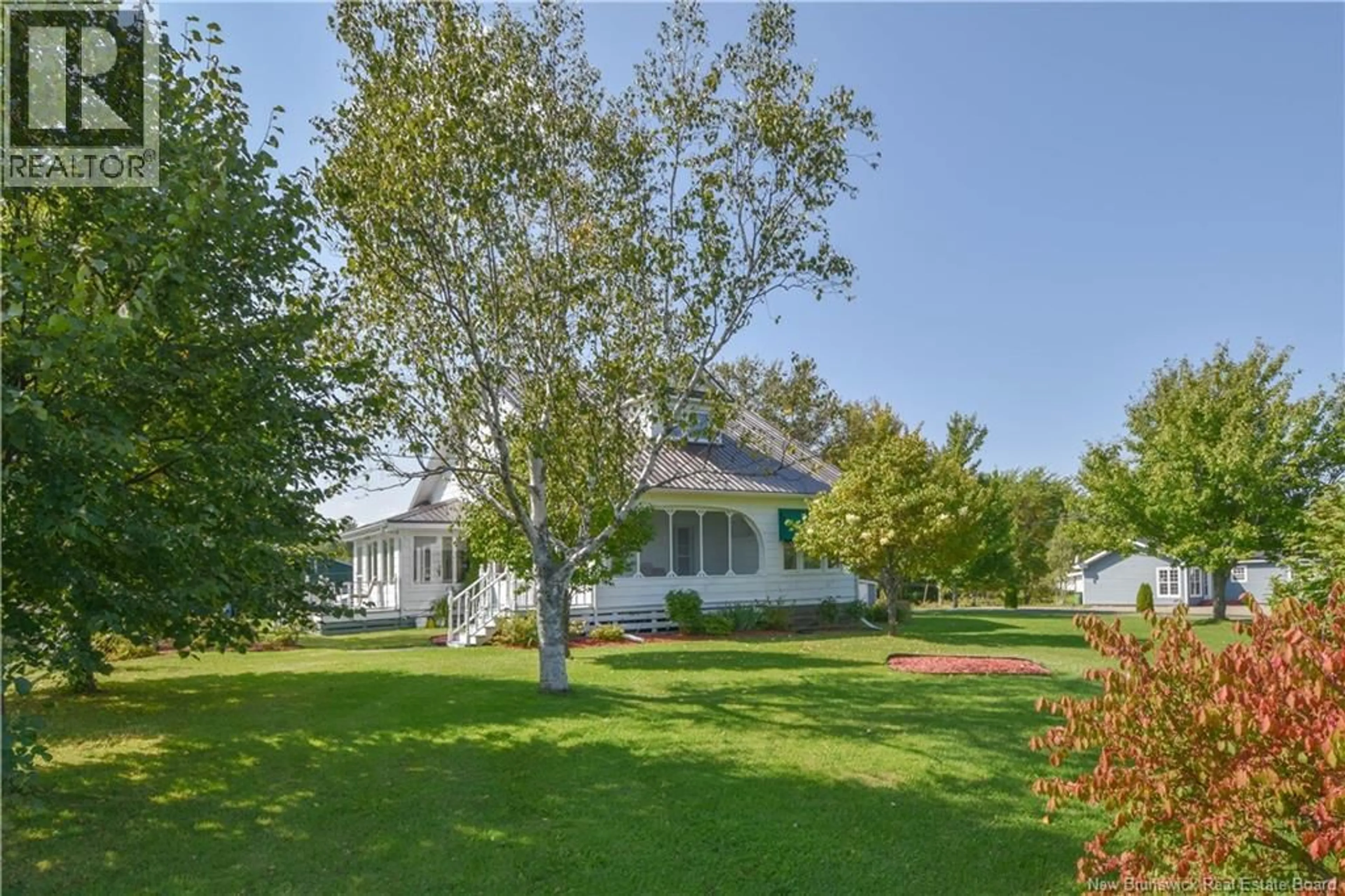 A pic from outside/outdoor area/front of a property/back of a property/a pic from drone, water/lake/river/ocean view for 12189 ROUTE 11, Village-Blanchard New Brunswick E8P1R3