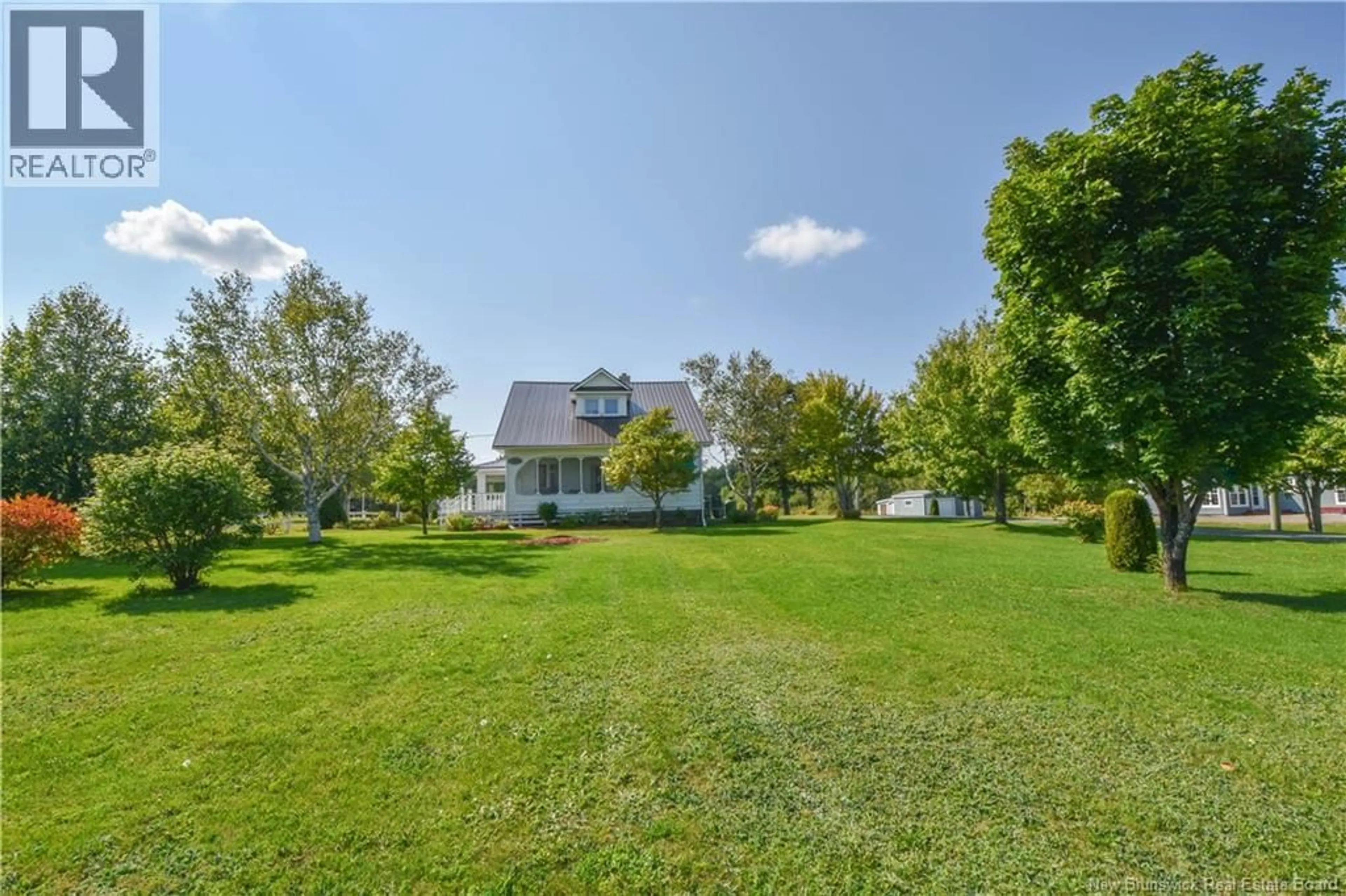 A pic from outside/outdoor area/front of a property/back of a property/a pic from drone, water/lake/river/ocean view for 12189 ROUTE 11, Village-Blanchard New Brunswick E8P1R3