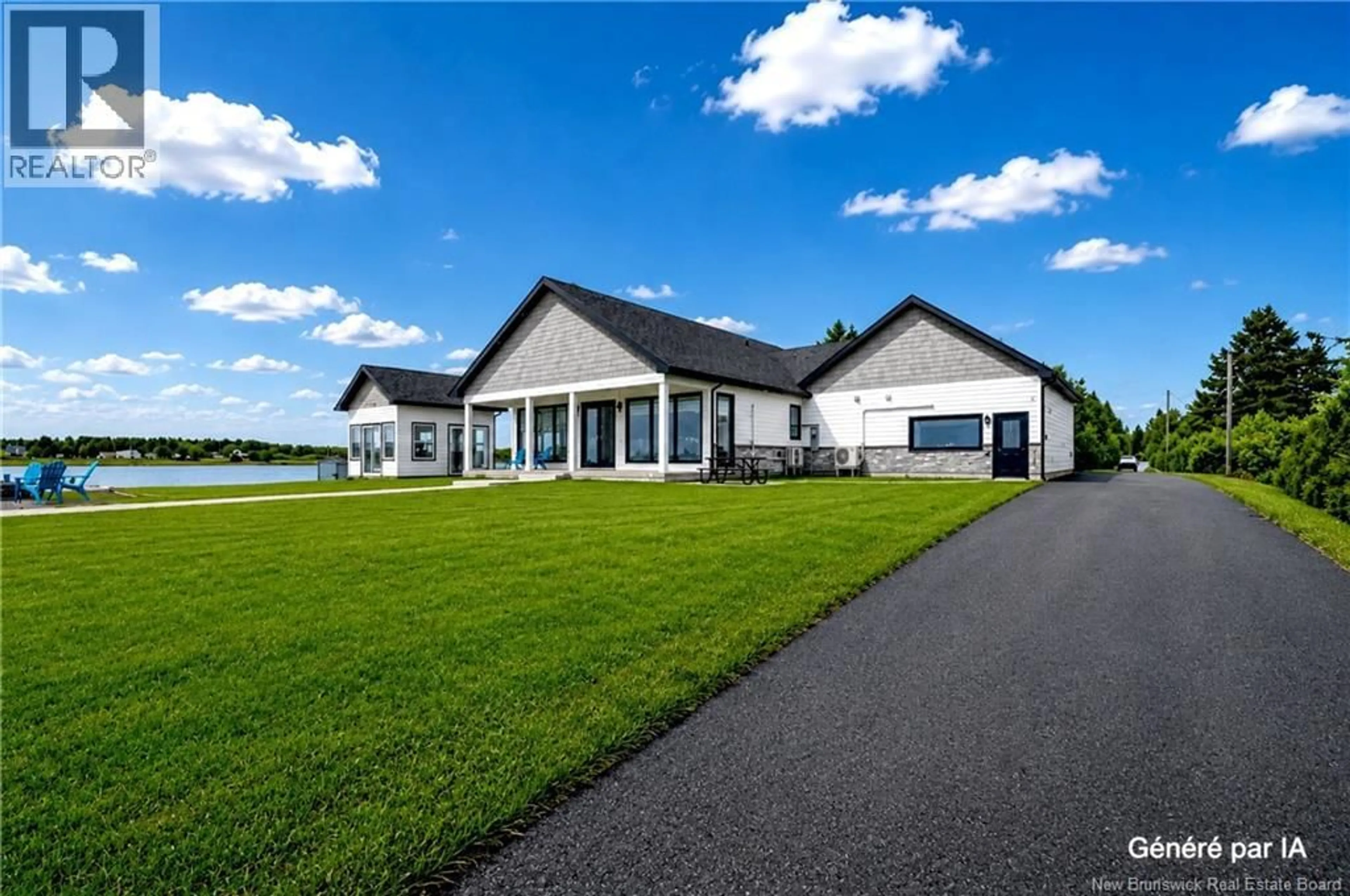 A pic from outside/outdoor area/front of a property/back of a property/a pic from drone, water/lake/river/ocean view for 293 CH SAULNIER EST, Tracadie New Brunswick E1X1E3