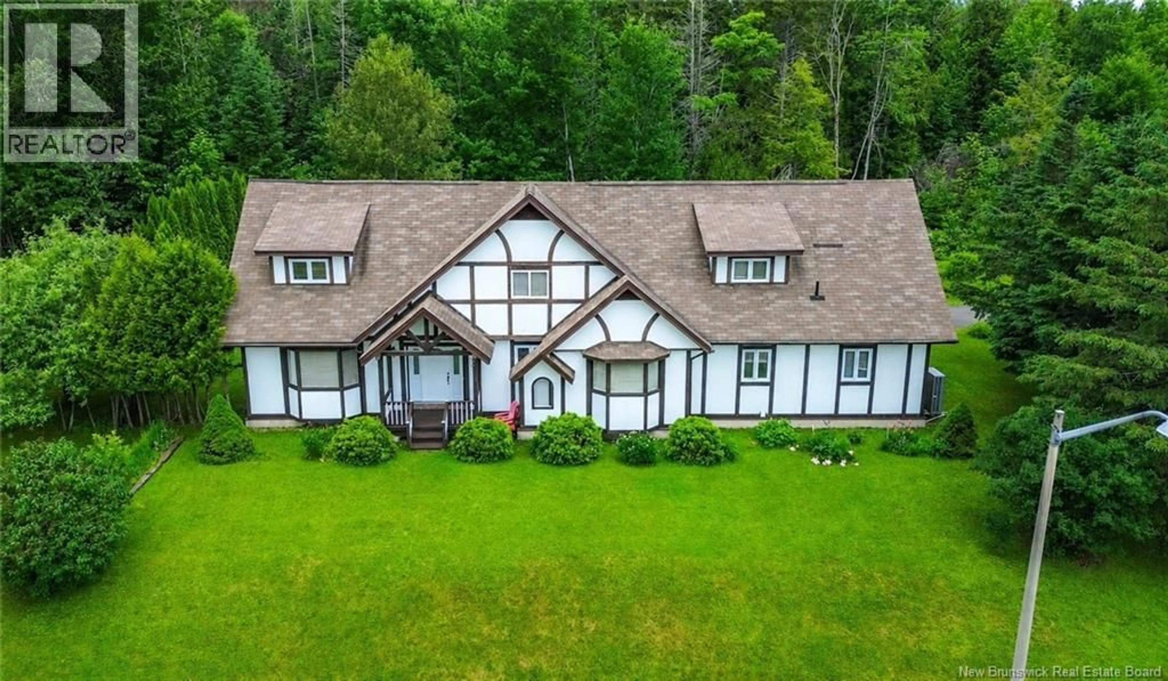 A pic from outside/outdoor area/front of a property/back of a property/a pic from drone, unknown for 15 DOYLE STREET, Nackawic New Brunswick E6G1E4