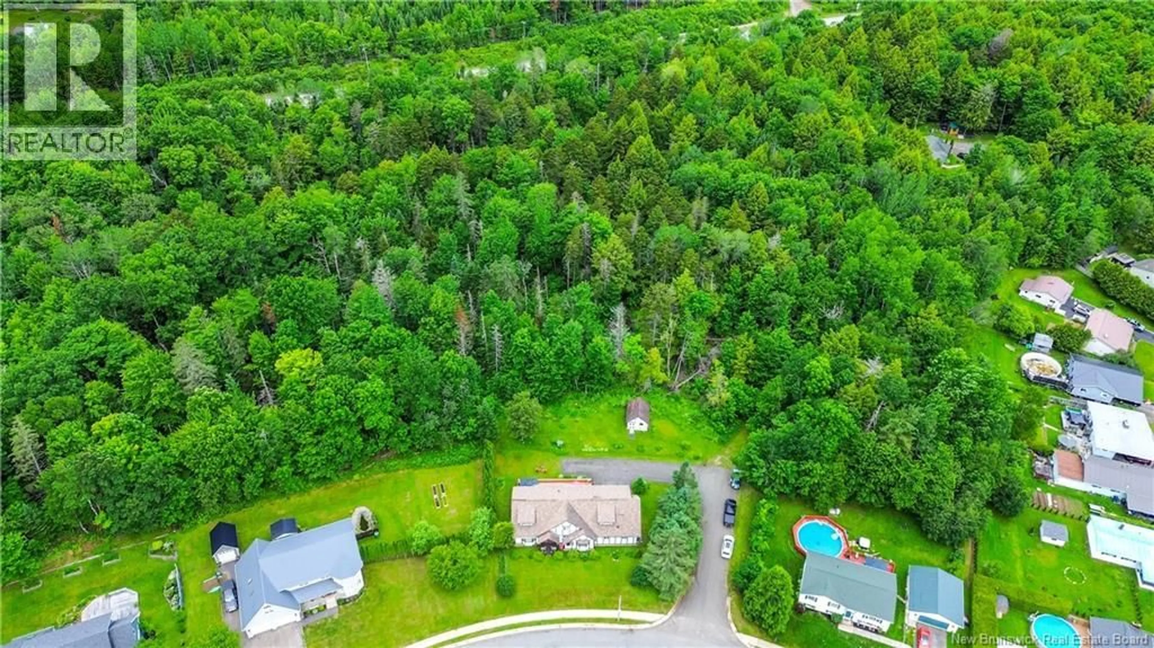 A pic from outside/outdoor area/front of a property/back of a property/a pic from drone, forest/trees view for 15 DOYLE STREET, Nackawic New Brunswick E6G1E4