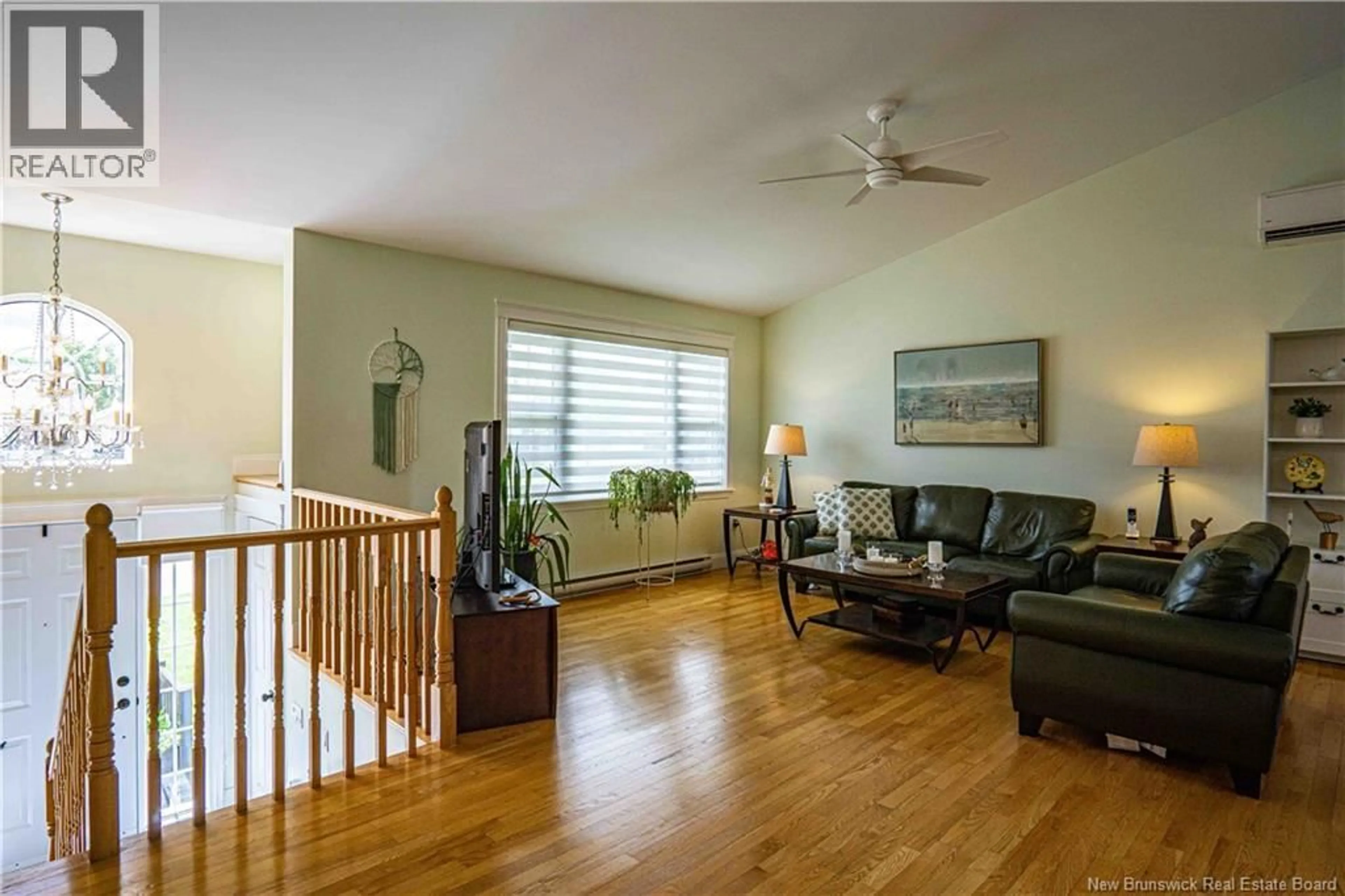 Living room with furniture, wood/laminate floor for 53 MOCKLER STREET, Oromocto New Brunswick E2V4R4