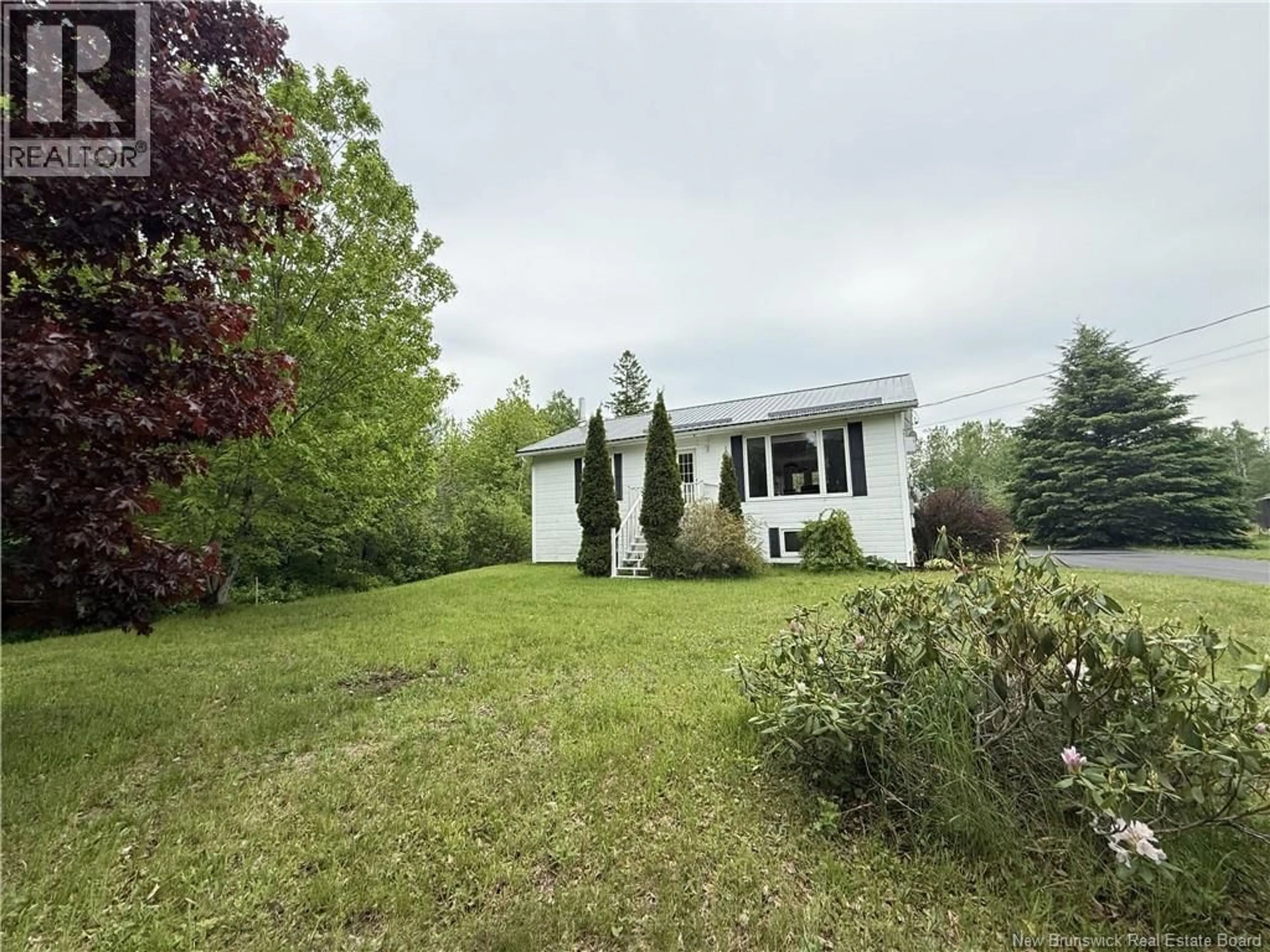 A pic from outside/outdoor area/front of a property/back of a property/a pic from drone, unknown for 431 BOULEVARD DES ACADIENS BOULEVARD, Bertrand New Brunswick E1W1G1