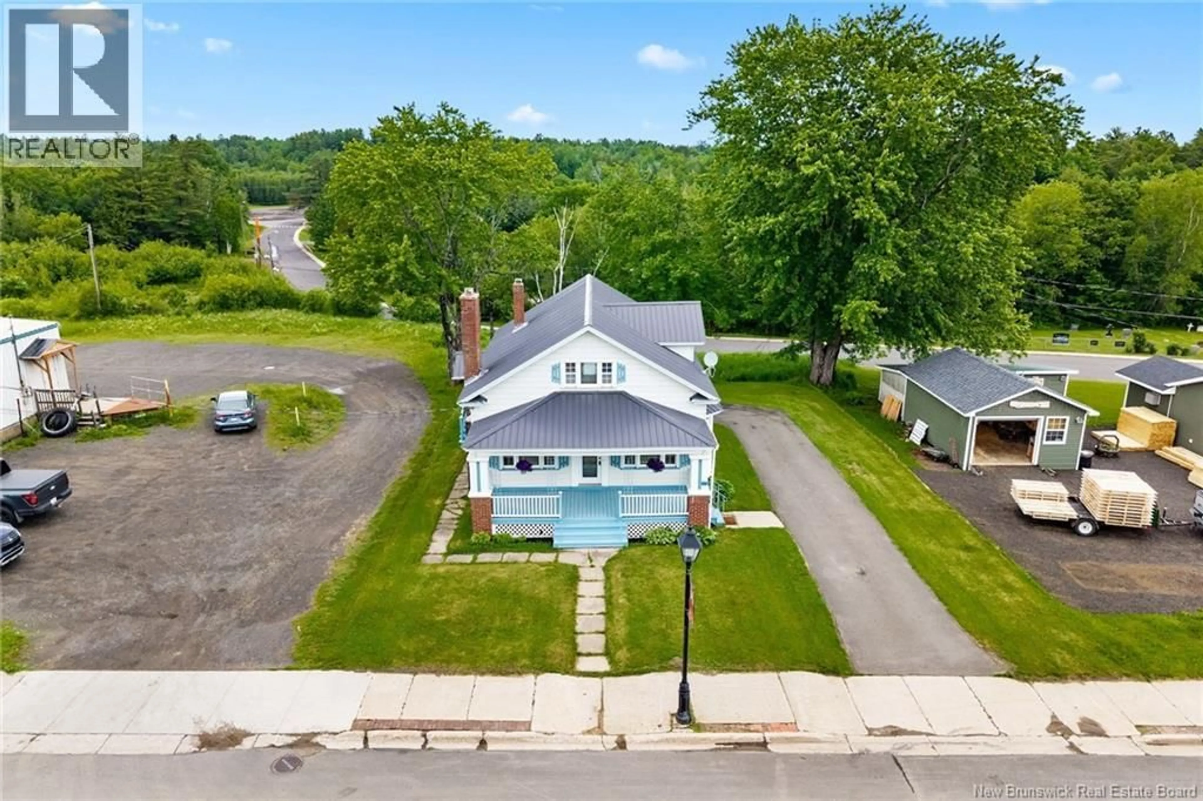 A pic from outside/outdoor area/front of a property/back of a property/a pic from drone, street for 98 MAIN STREET, Minto New Brunswick E4B3M2