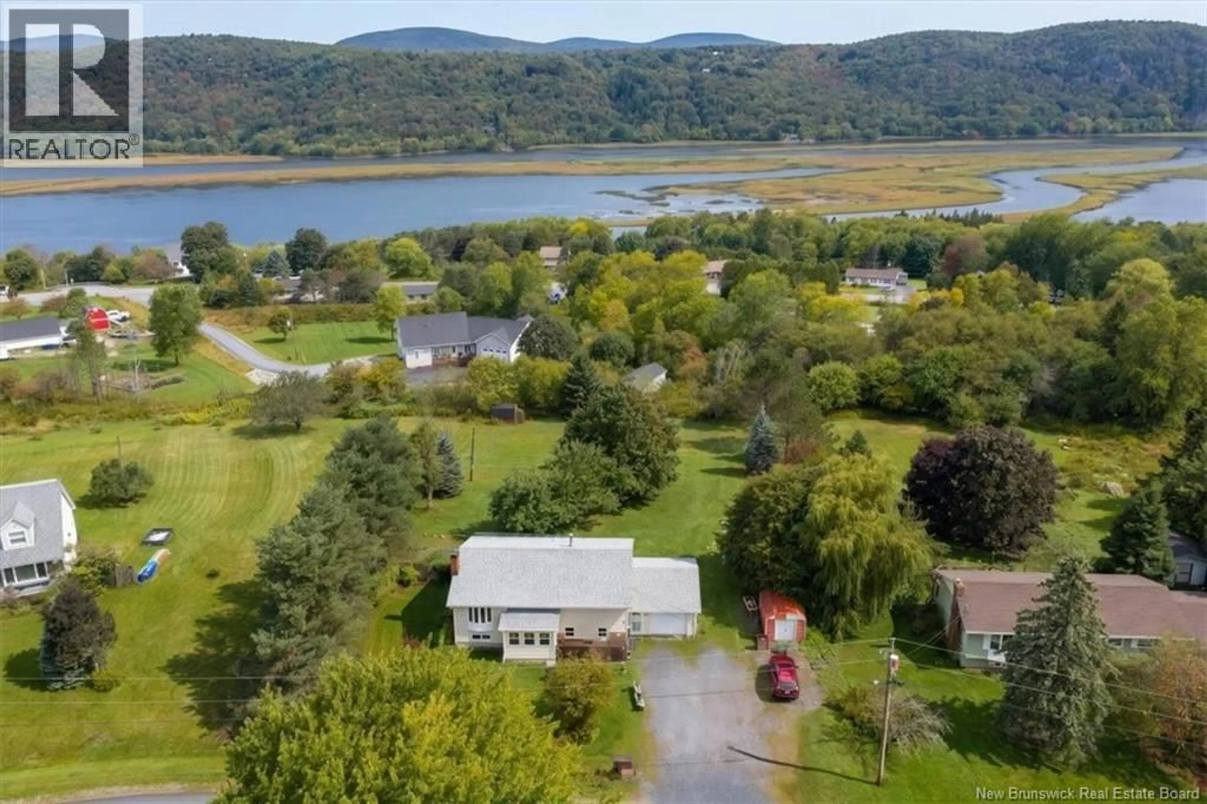 A pic from outside/outdoor area/front of a property/back of a property/a pic from drone, water/lake/river/ocean view for 35 REYNAR DRIVE, Quispamsis New Brunswick E2G1J9