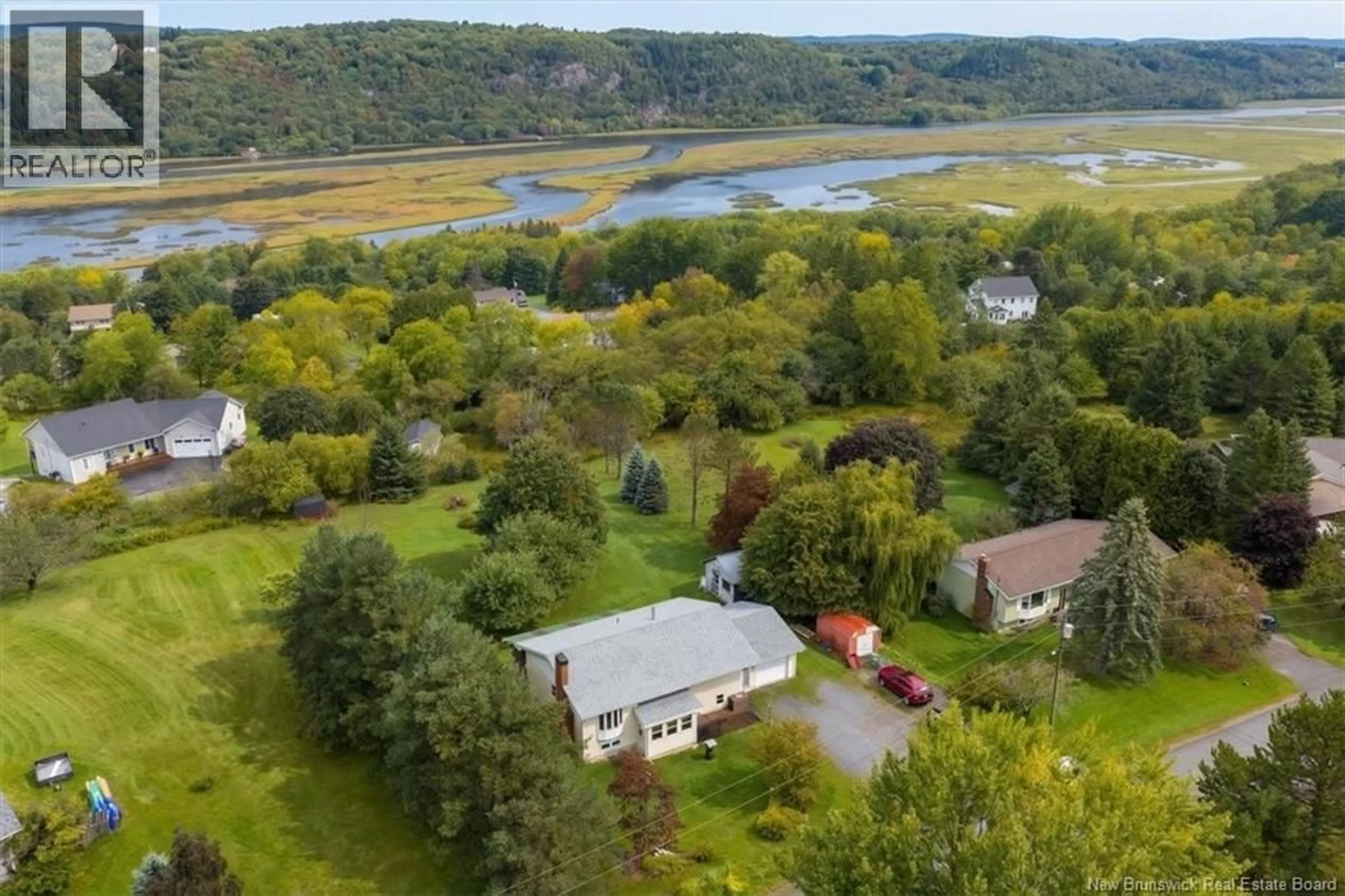 A pic from outside/outdoor area/front of a property/back of a property/a pic from drone, water/lake/river/ocean view for 35 REYNAR DRIVE, Quispamsis New Brunswick E2G1J9