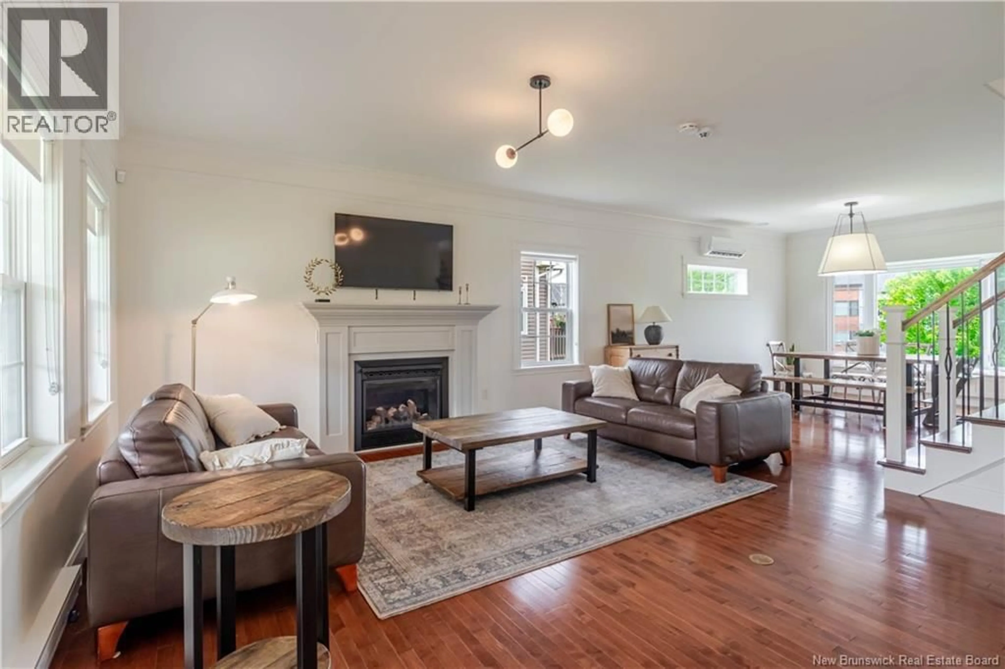 Living room with furniture, wood/laminate floor for 183 GARDEN STREET, Fredericton New Brunswick E3B0P6