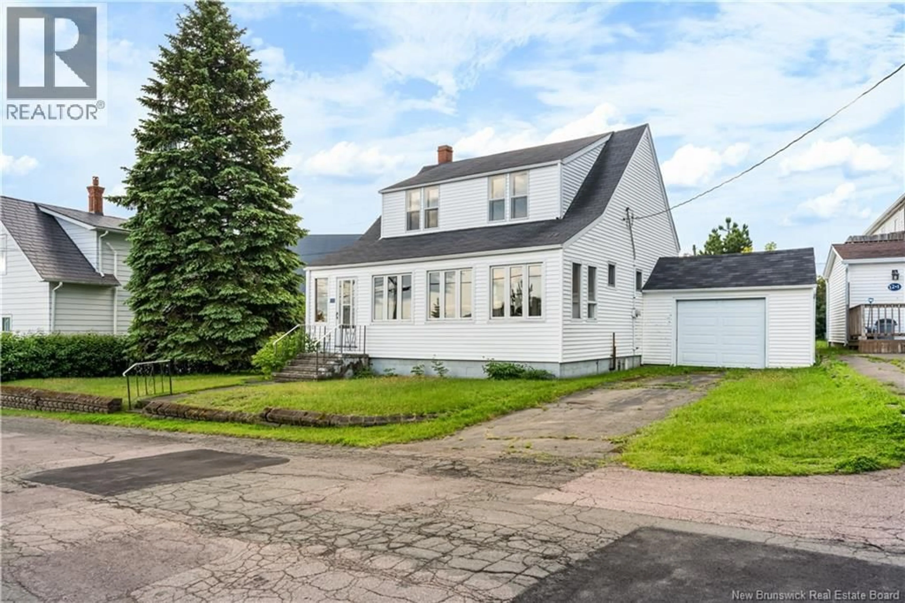 A pic from outside/outdoor area/front of a property/back of a property/a pic from drone, street for 10 BELLEVUE STREET, Bouctouche New Brunswick E4S2W3