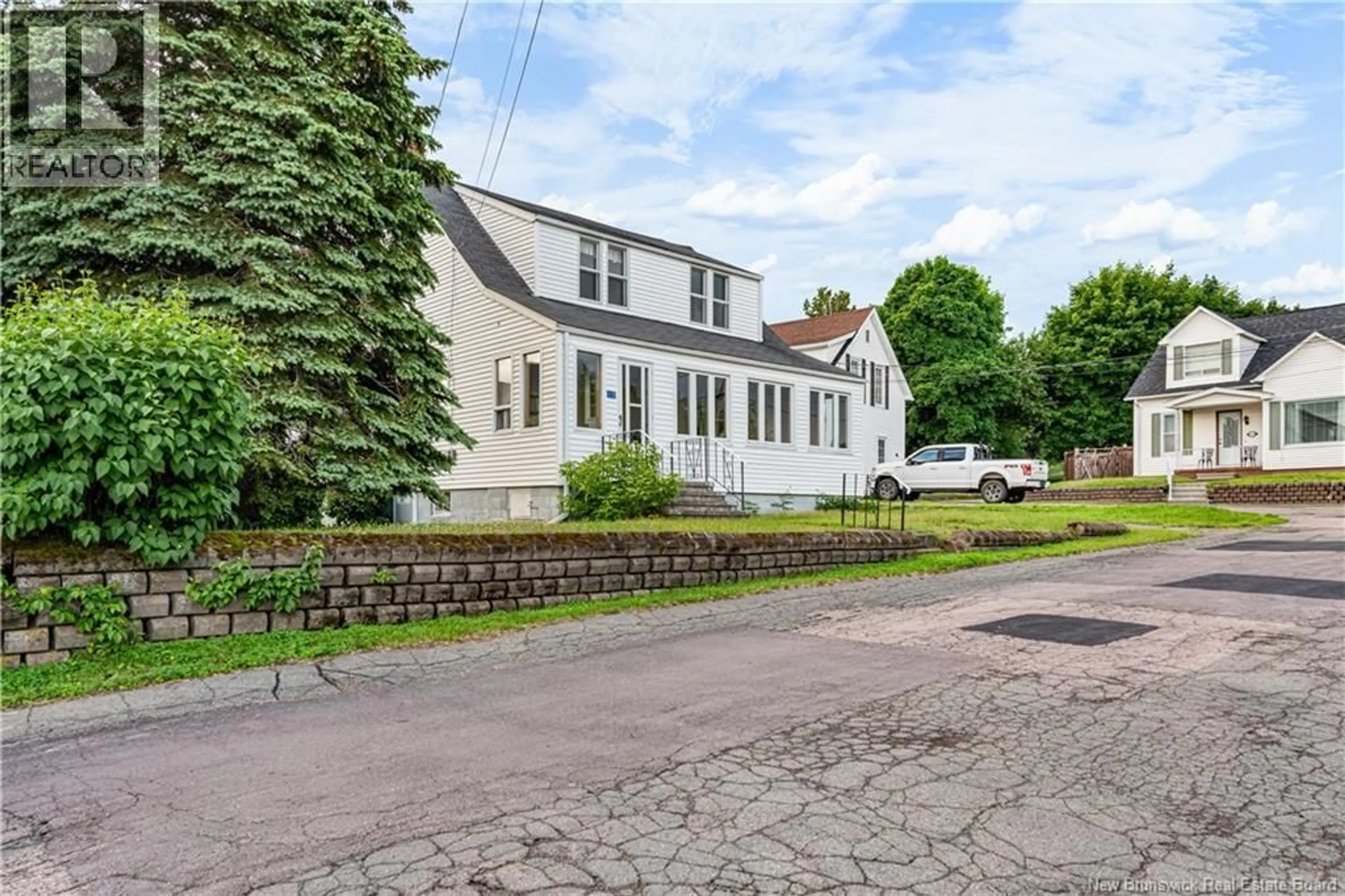 A pic from outside/outdoor area/front of a property/back of a property/a pic from drone, street for 10 BELLEVUE STREET, Bouctouche New Brunswick E4S2W3