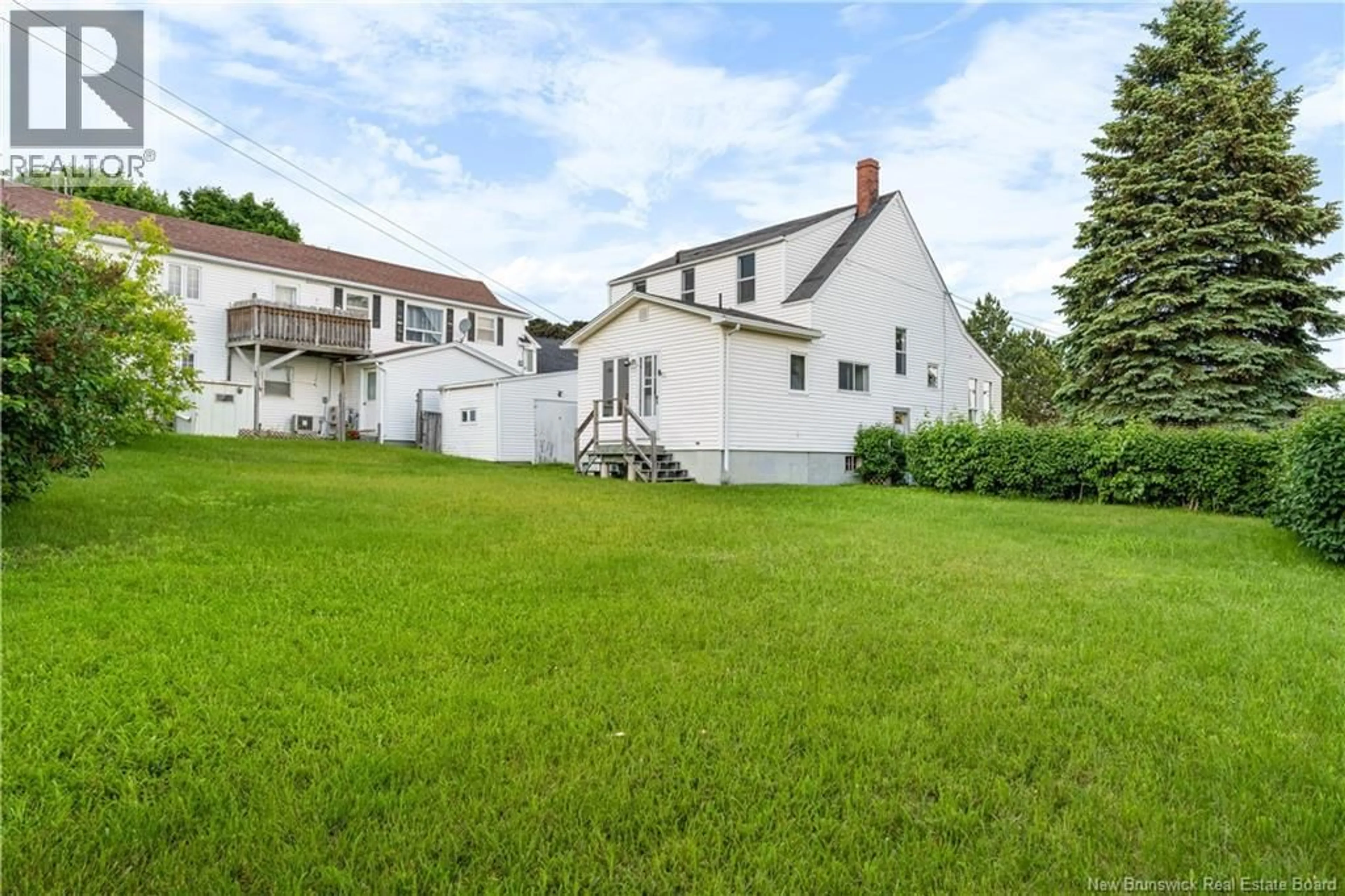 A pic from outside/outdoor area/front of a property/back of a property/a pic from drone, building for 10 BELLEVUE STREET, Bouctouche New Brunswick E4S2W3