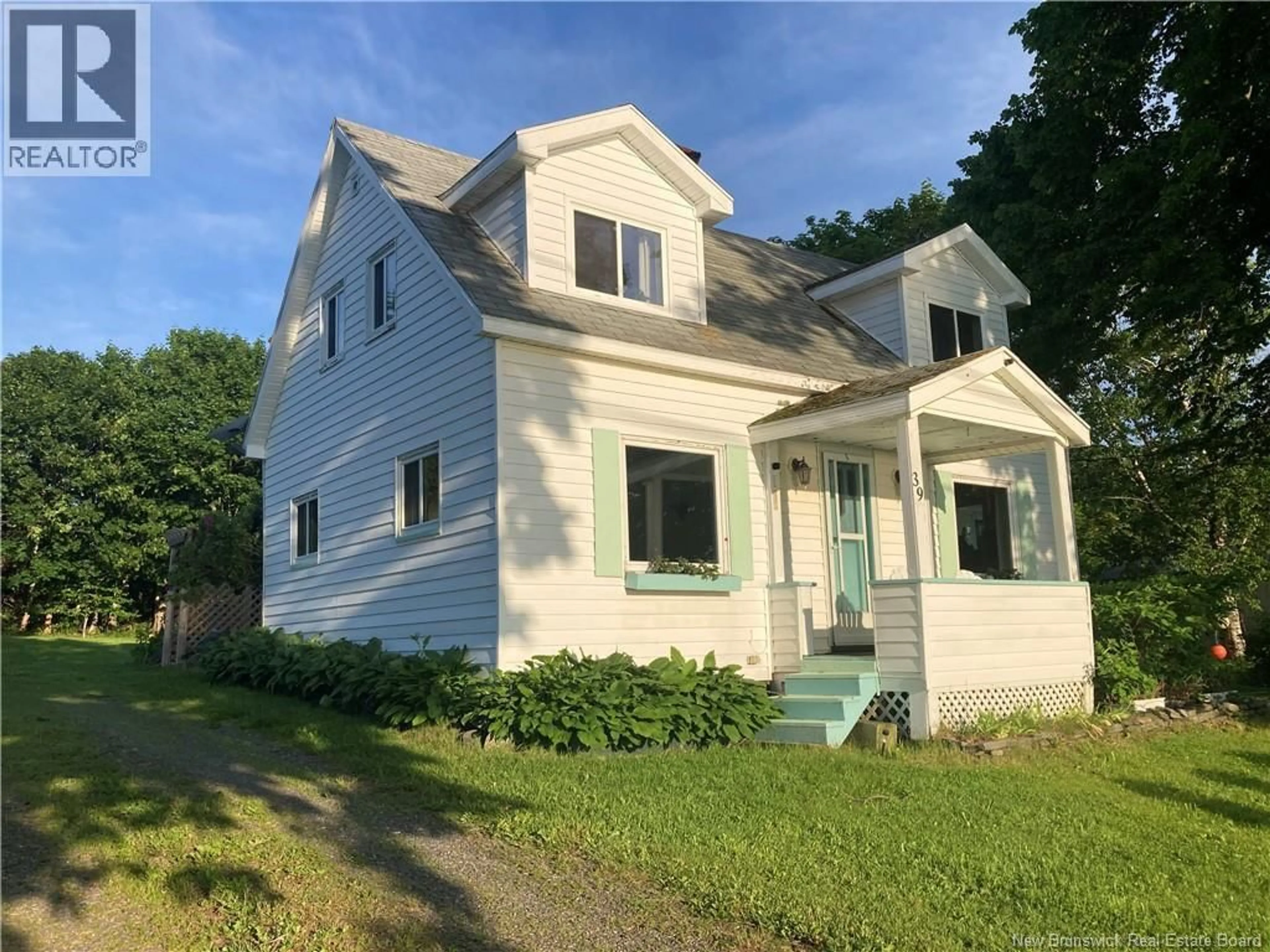 Home with vinyl exterior material, street for 39 COOKS POINT ROAD, Wilsons Beach New Brunswick E5E1V4