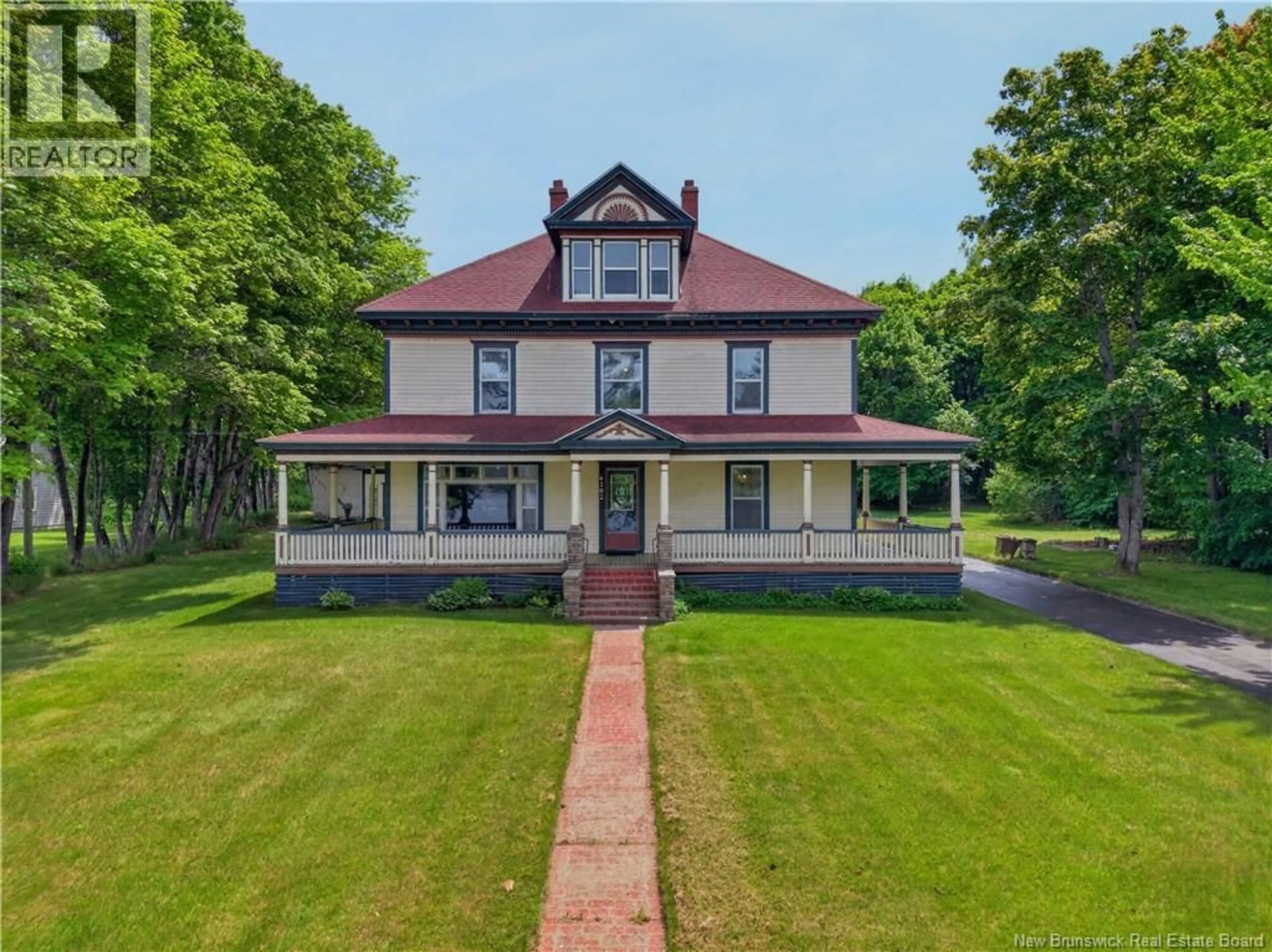 A pic from outside/outdoor area/front of a property/back of a property/a pic from drone, unknown for 4202 WATER STREET, Miramichi New Brunswick E1N4L2