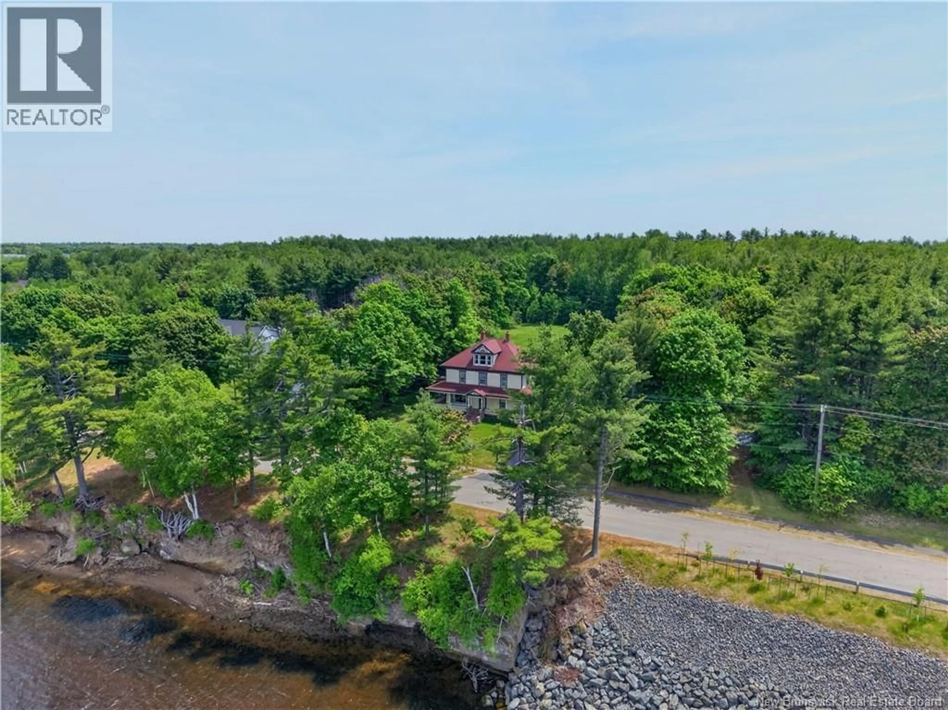 A pic from outside/outdoor area/front of a property/back of a property/a pic from drone, water/lake/river/ocean view for 4202 WATER STREET, Miramichi New Brunswick E1N4L2