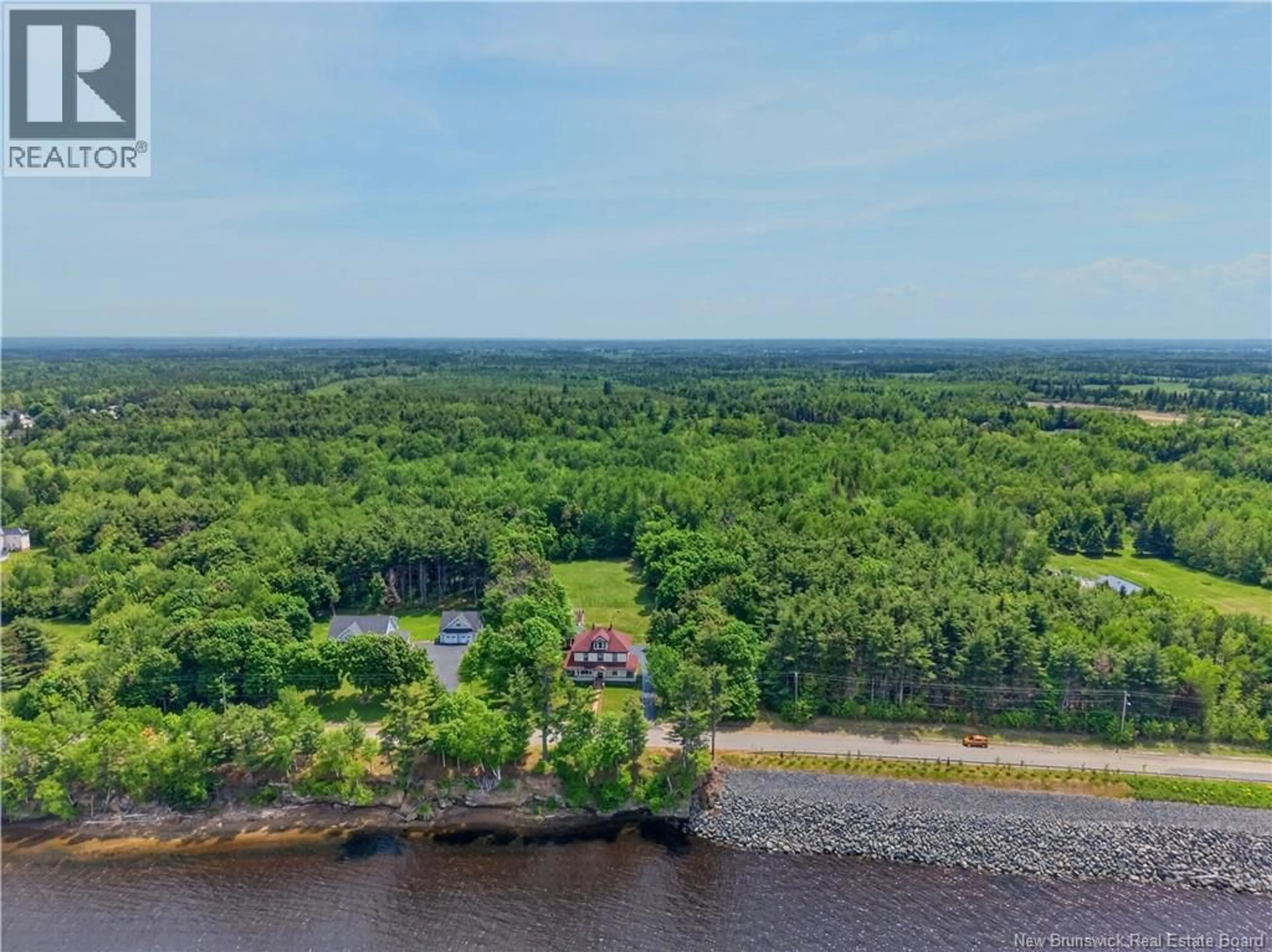 A pic from outside/outdoor area/front of a property/back of a property/a pic from drone, water/lake/river/ocean view for 4202 WATER STREET, Miramichi New Brunswick E1N4L2