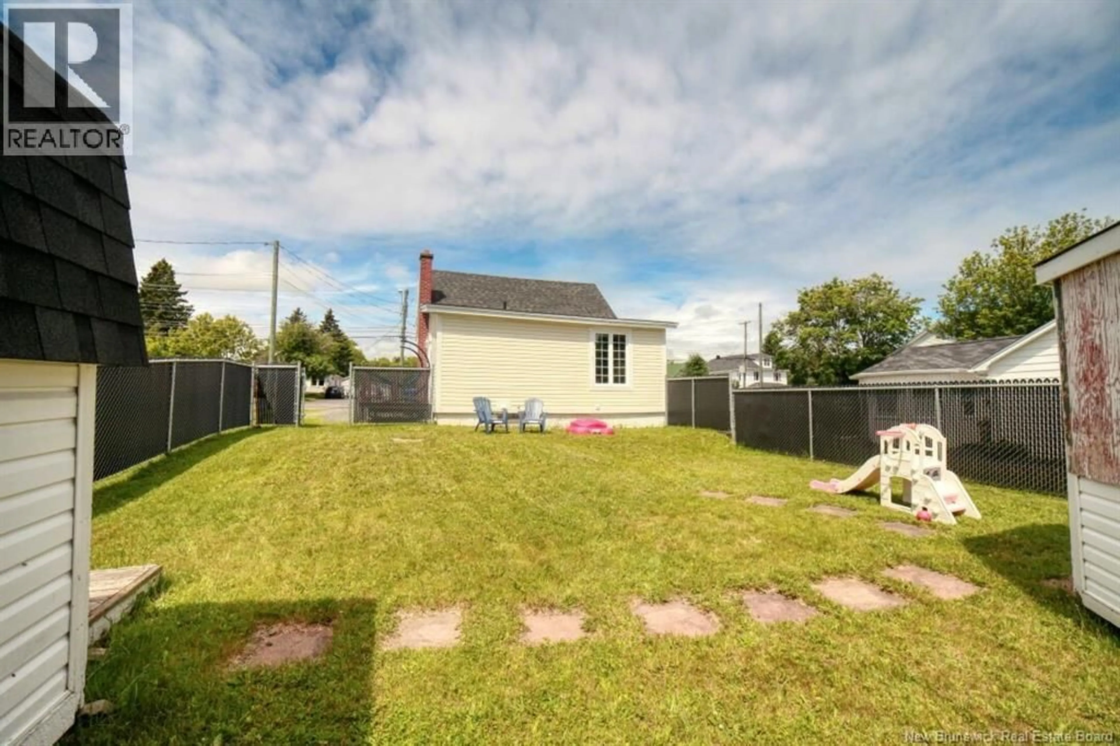 A pic from outside/outdoor area/front of a property/back of a property/a pic from drone, street for 250 RAYMOND, Bathurst New Brunswick E2A2V9