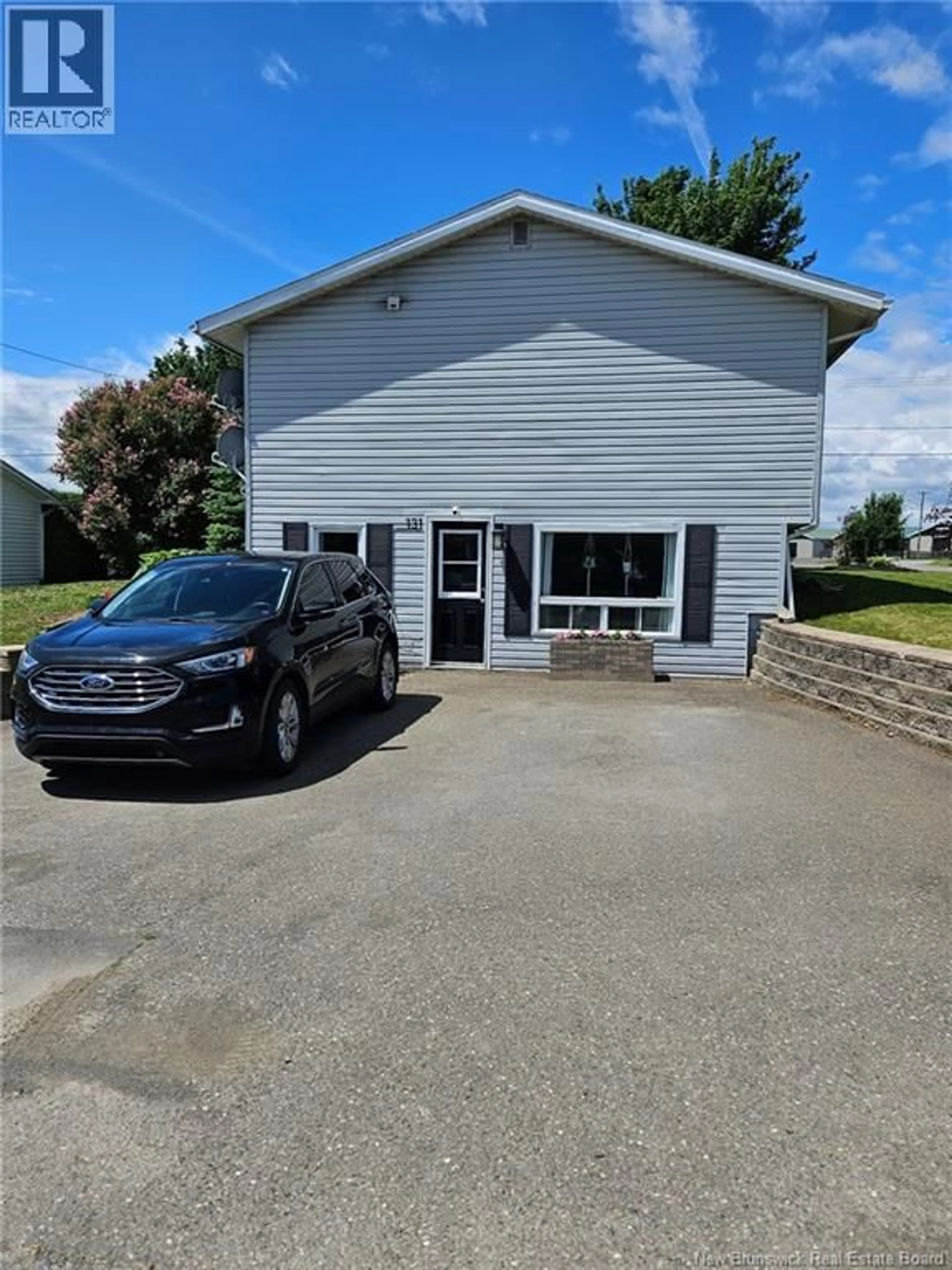 A pic from outside/outdoor area/front of a property/back of a property/a pic from drone, building for 131 KIRKPATRICK STREET, Woodstock New Brunswick E7M2B2