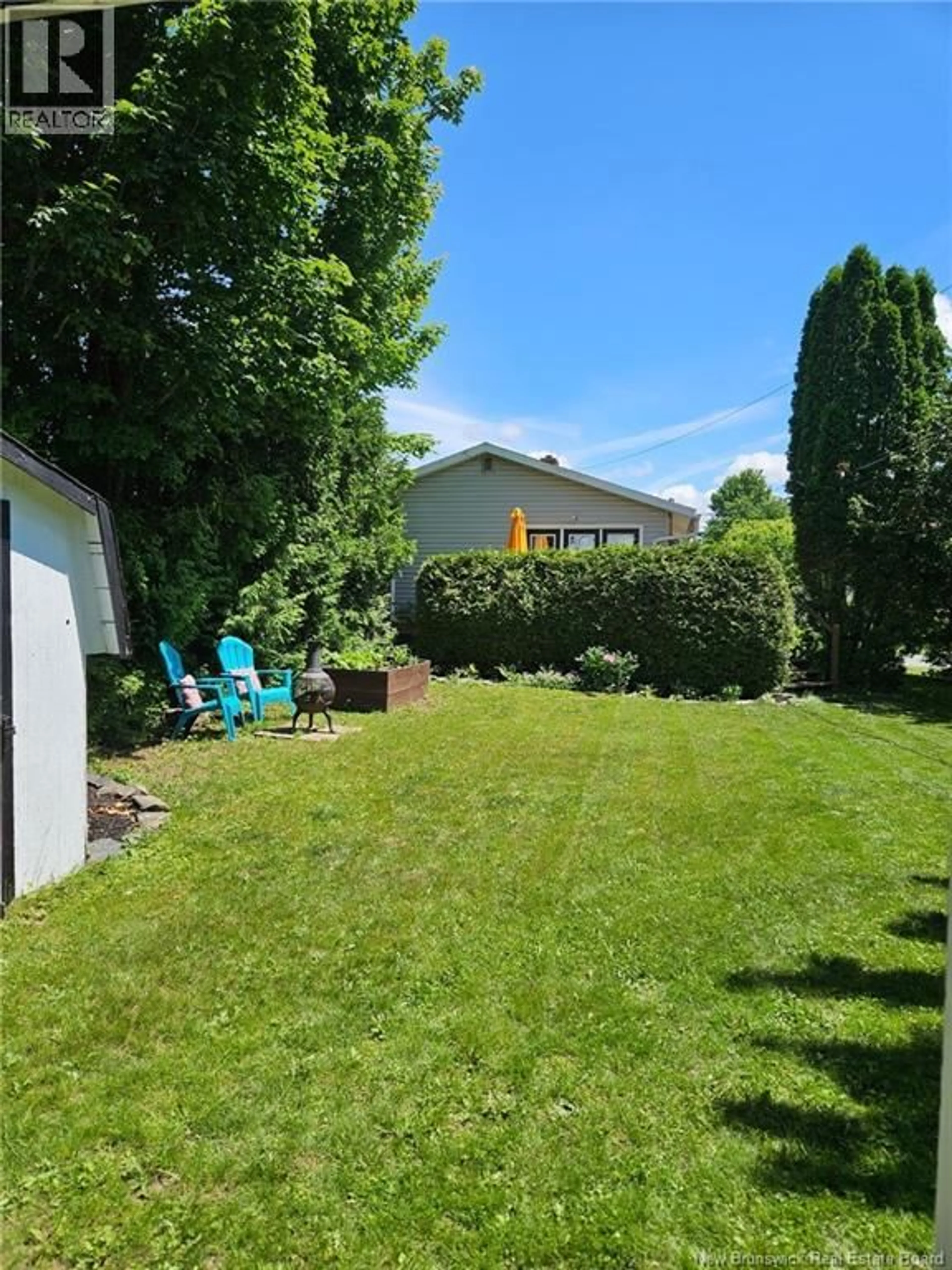 A pic from outside/outdoor area/front of a property/back of a property/a pic from drone, unknown for 131 KIRKPATRICK STREET, Woodstock New Brunswick E7M2B2