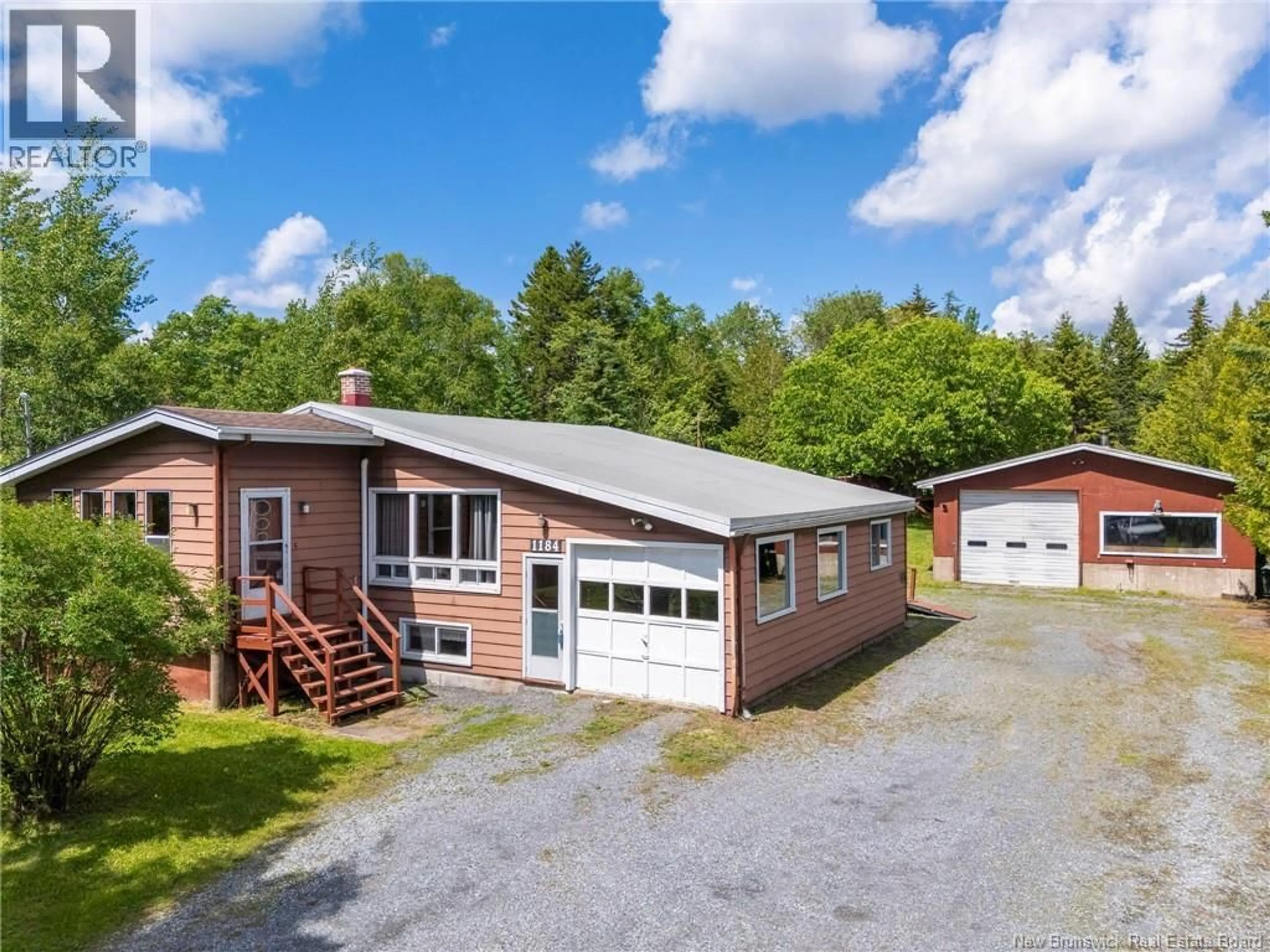 A pic from outside/outdoor area/front of a property/back of a property/a pic from drone, unknown for 1184 WESTFIELD RD, Saint John New Brunswick E2M7N4
