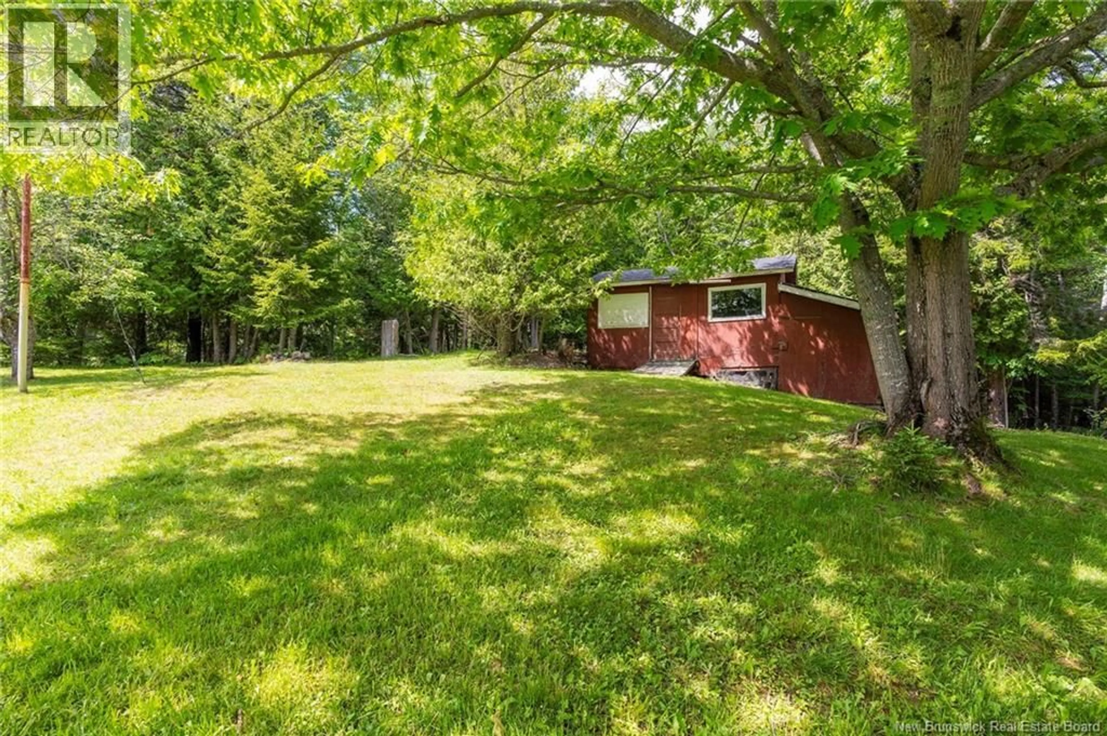 A pic from outside/outdoor area/front of a property/back of a property/a pic from drone, forest/trees view for 1184 WESTFIELD RD, Saint John New Brunswick E2M7N4