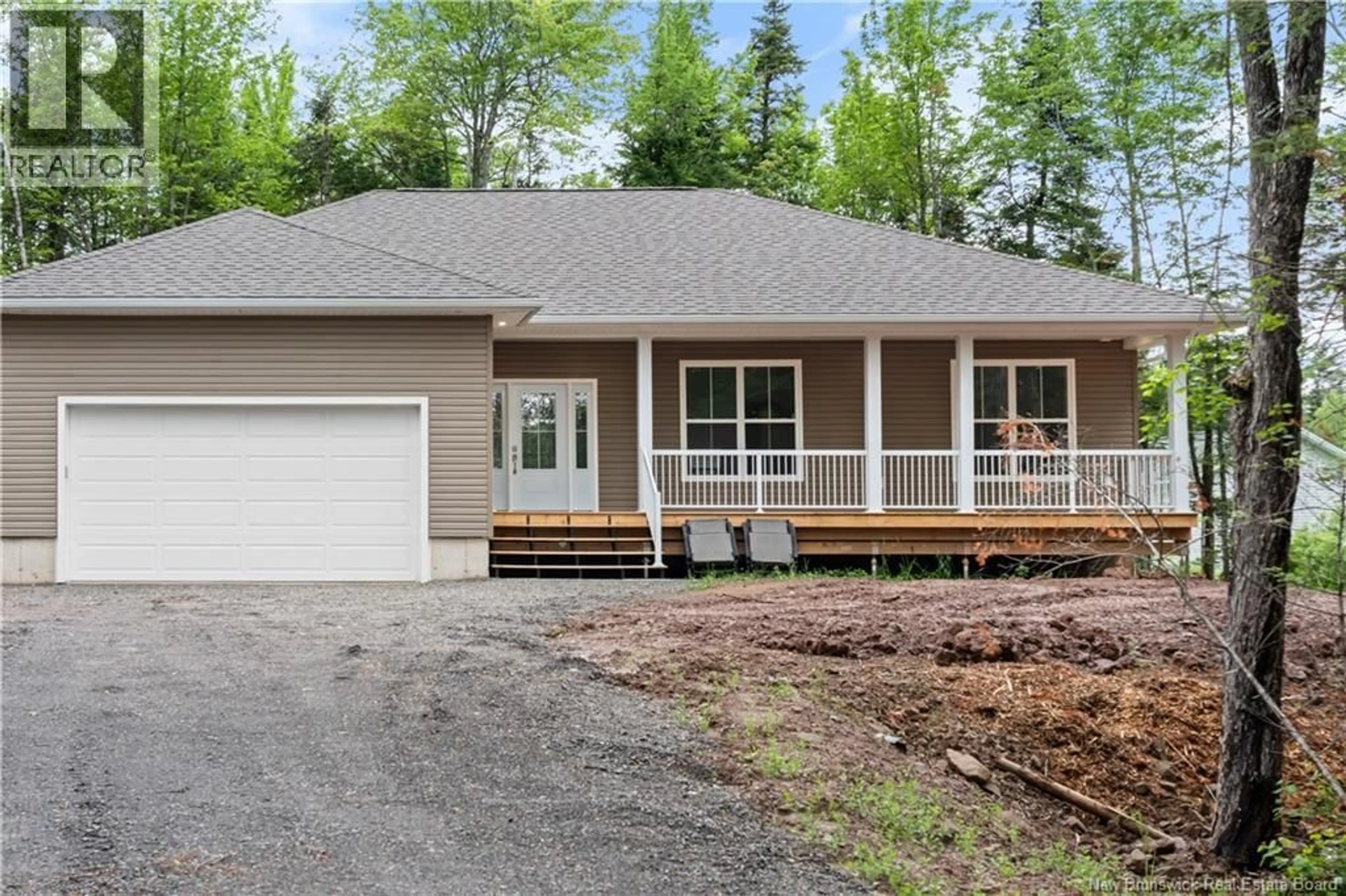 Home with vinyl exterior material, street for 25 DES GAMINS STREET, Lakeville New Brunswick E1H0J7