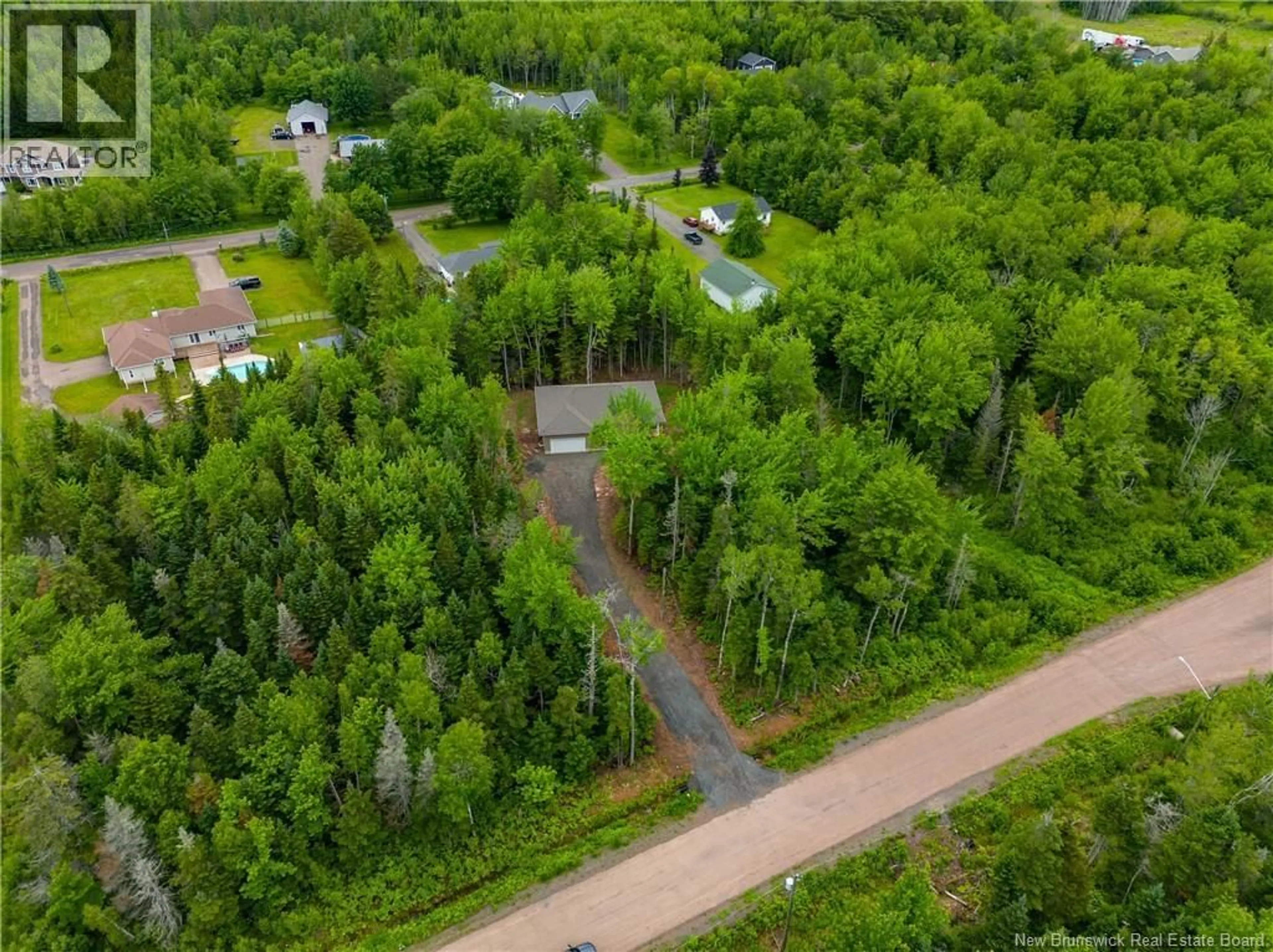 A pic from outside/outdoor area/front of a property/back of a property/a pic from drone, forest/trees view for 25 DES GAMINS STREET, Lakeville New Brunswick E1H0J7