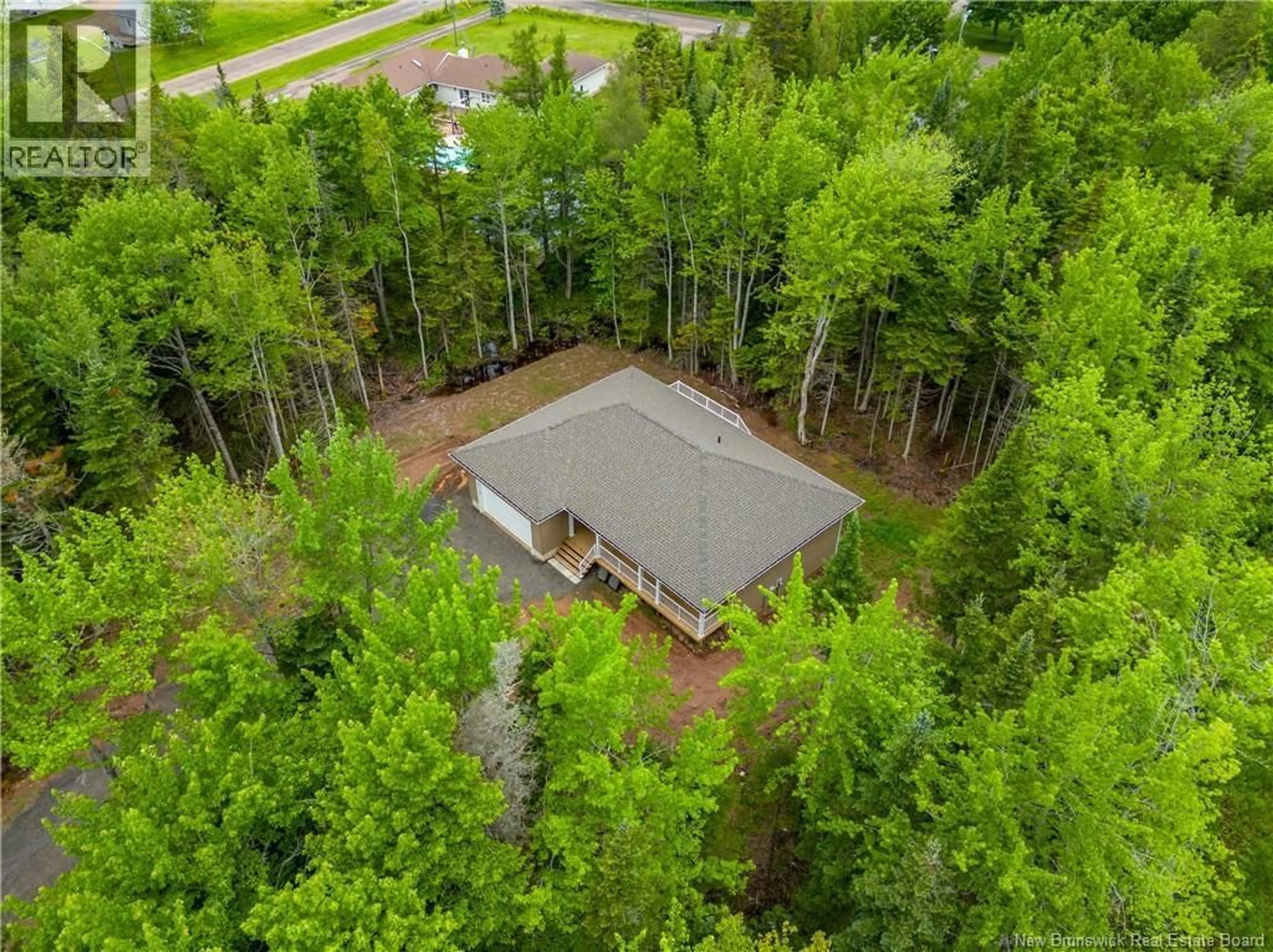 A pic from outside/outdoor area/front of a property/back of a property/a pic from drone, forest/trees view for 25 DES GAMINS STREET, Lakeville New Brunswick E1H0J7