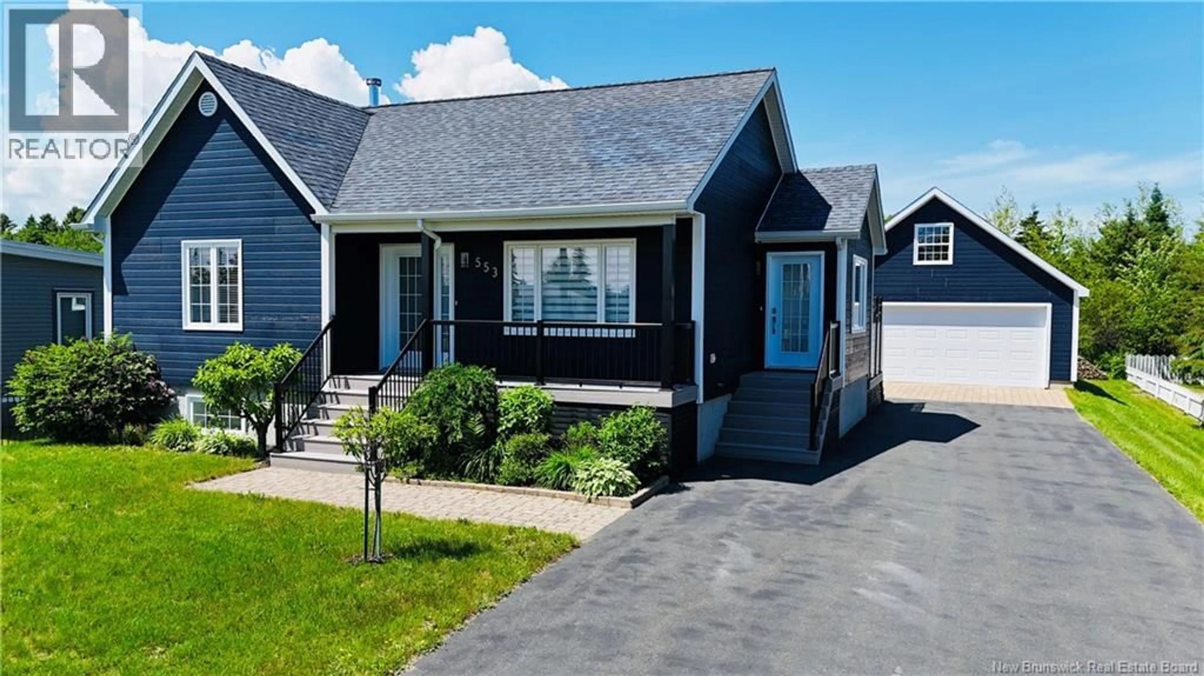 Home with vinyl exterior material, street for 553 RUE RIVIÈRE À LA TRUITE RUE, Tracadie New Brunswick E1X1A7