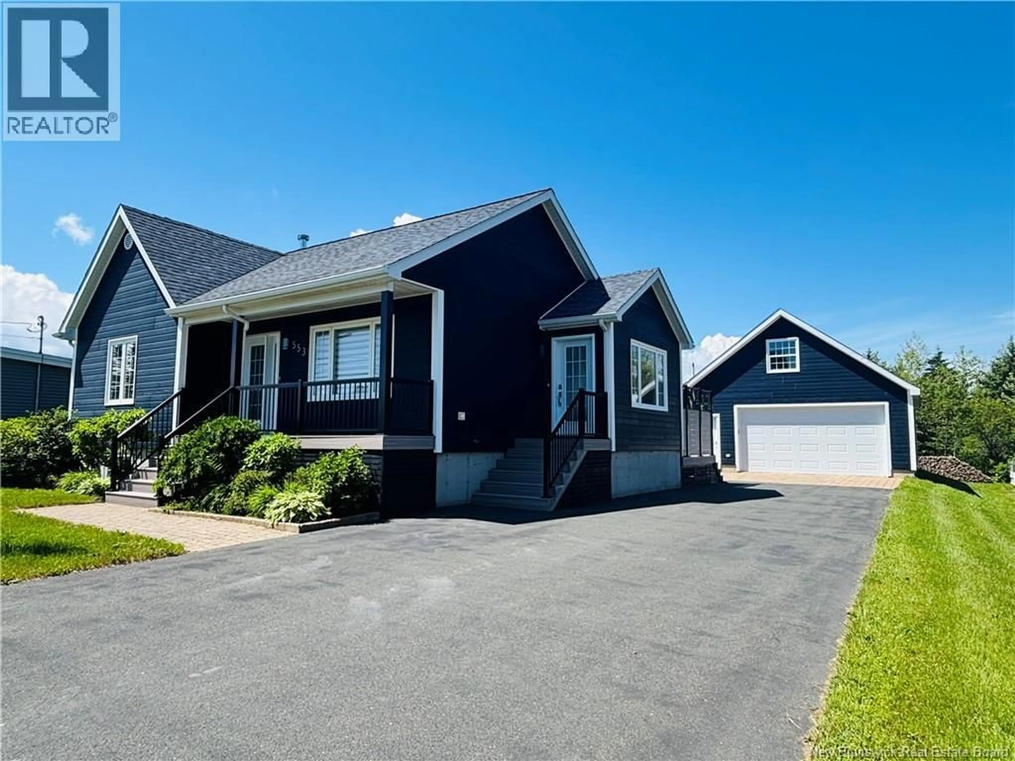 Home with vinyl exterior material, street for 553 RUE RIVIÈRE À LA TRUITE RUE, Tracadie New Brunswick E1X1A7