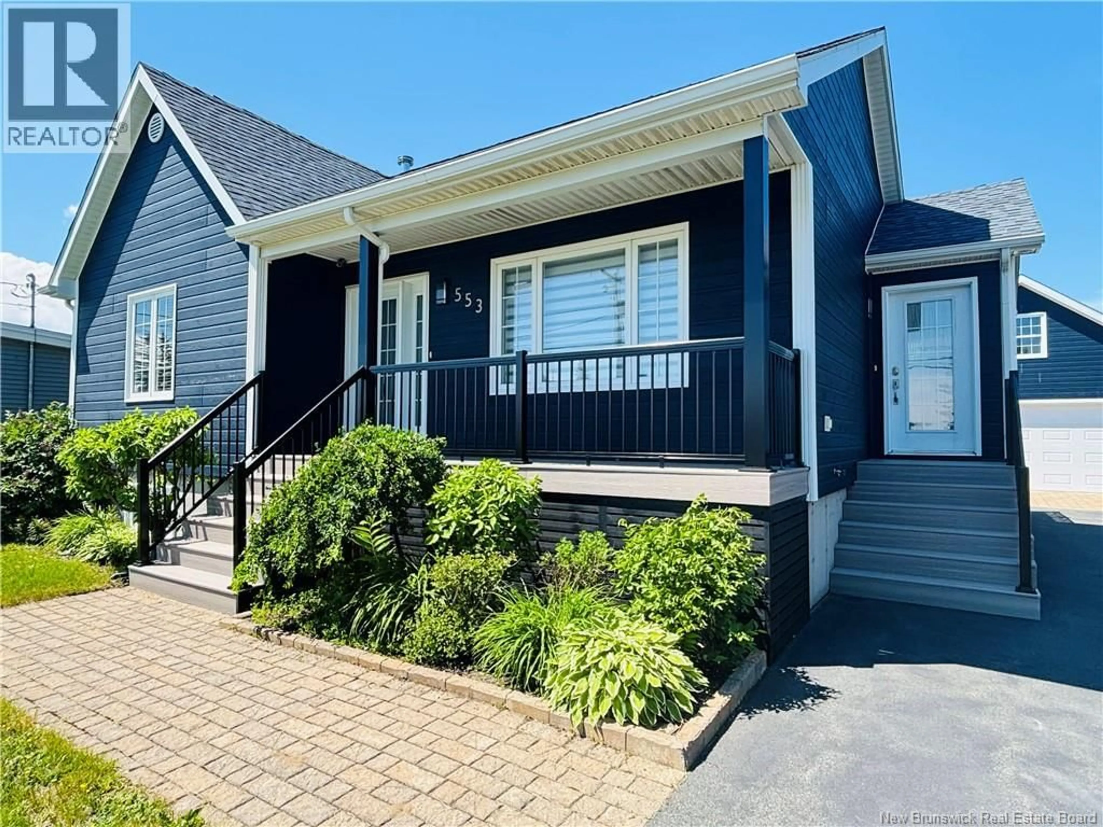 Home with vinyl exterior material, street for 553 RUE RIVIÈRE À LA TRUITE RUE, Tracadie New Brunswick E1X1A7