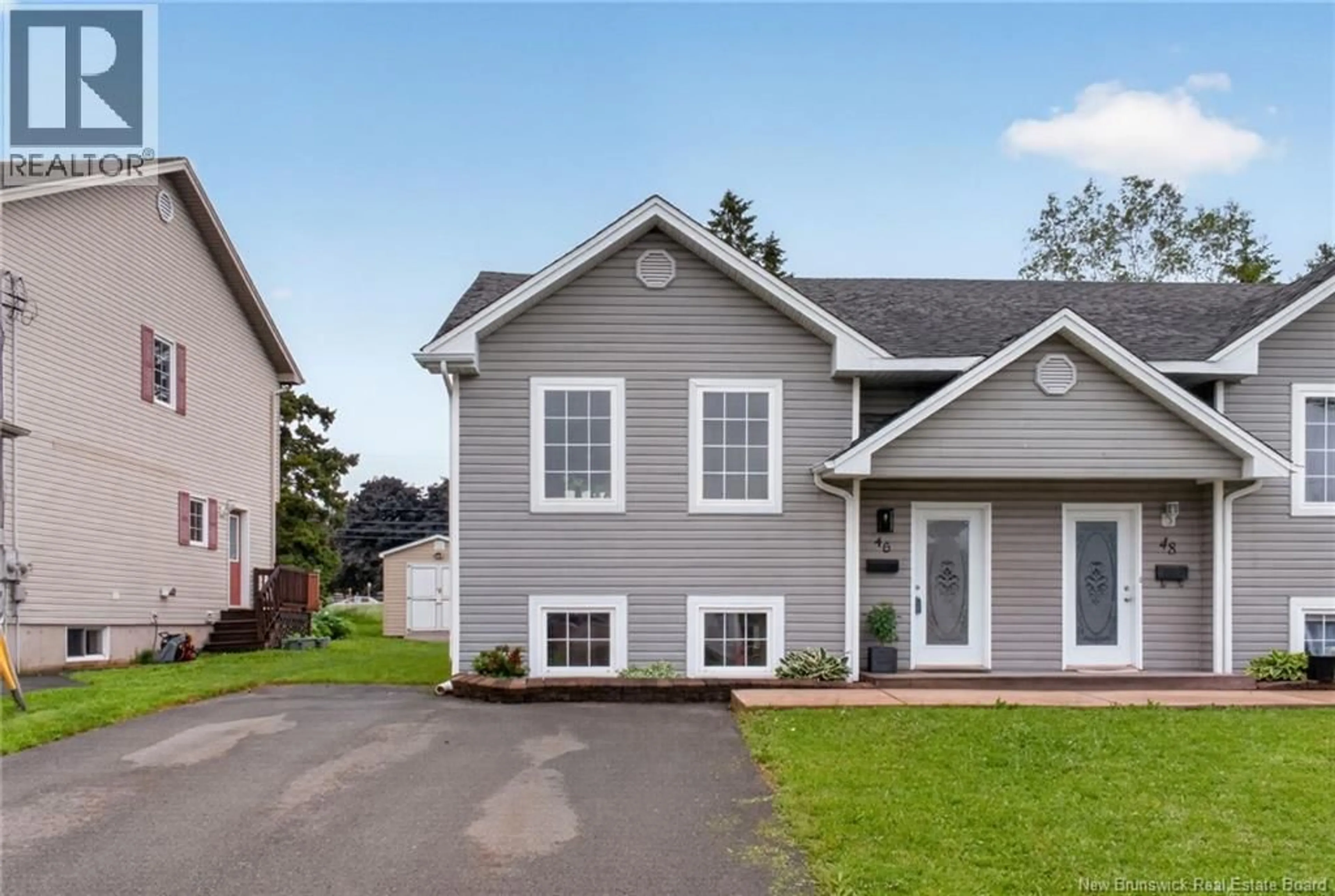 Home with vinyl exterior material, street for 46 DEVARENNE, Dieppe New Brunswick E1A0C8