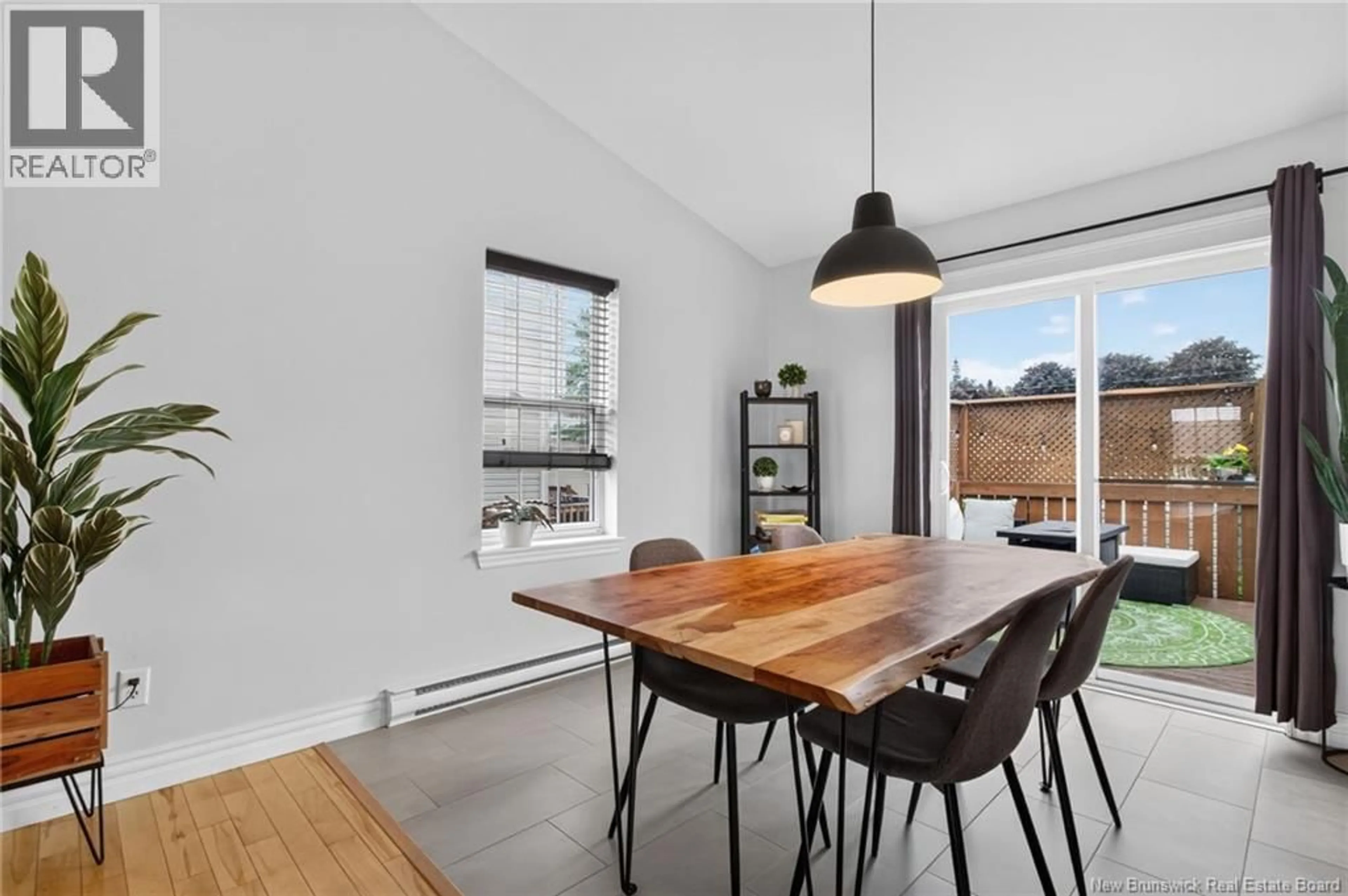 Dining room, wood/laminate floor for 46 DEVARENNE, Dieppe New Brunswick E1A0C8