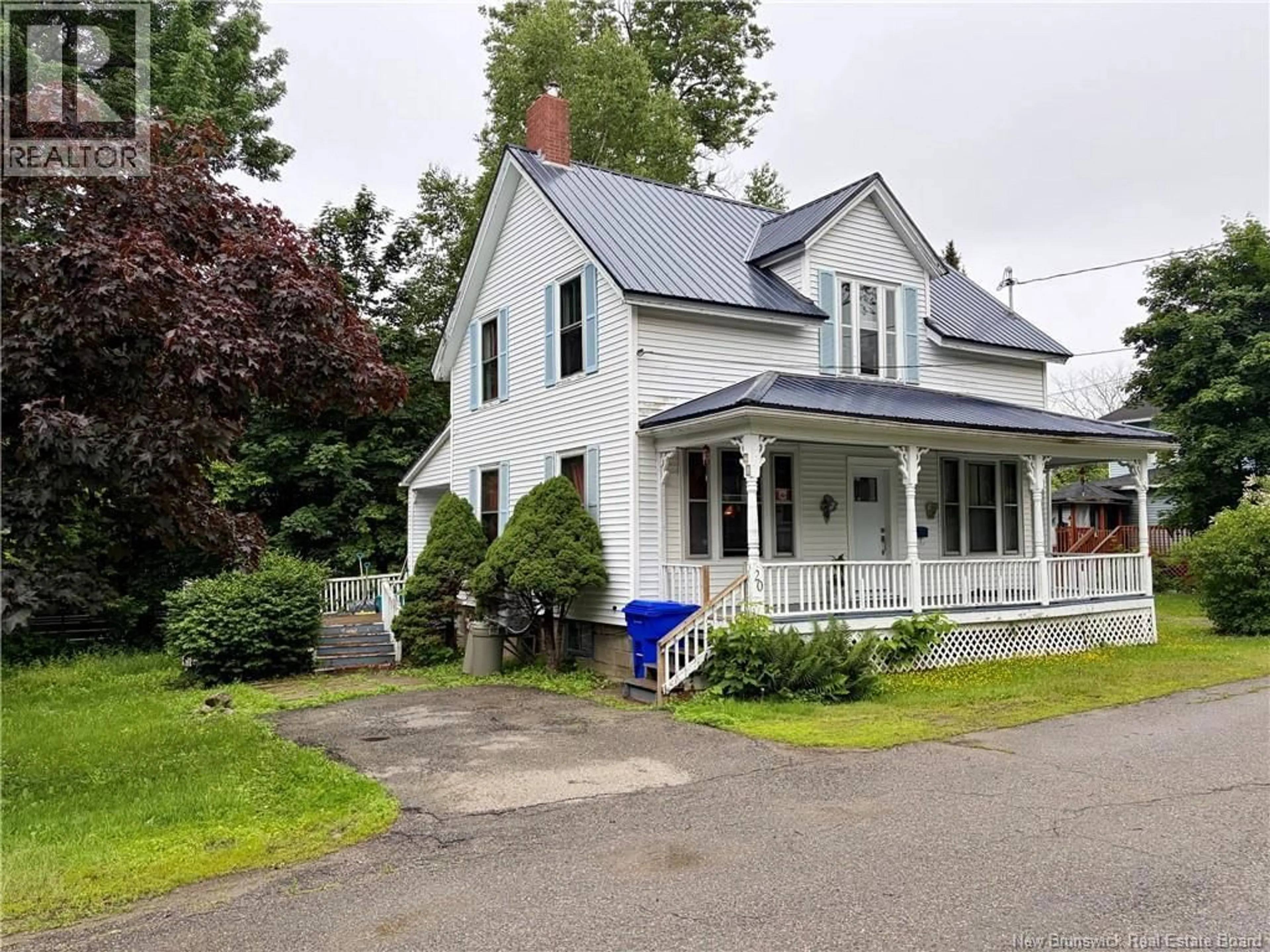 Home with vinyl exterior material, street for 20 GEORGE STREET, St. Stephen New Brunswick E3L2A8
