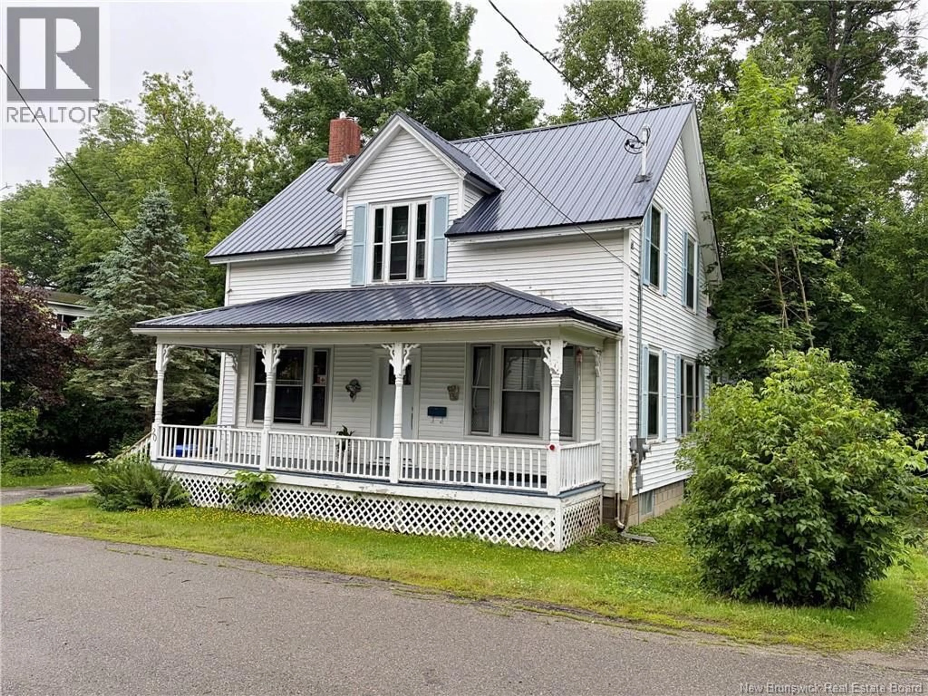 Home with vinyl exterior material, street for 20 GEORGE STREET, St. Stephen New Brunswick E3L2A8