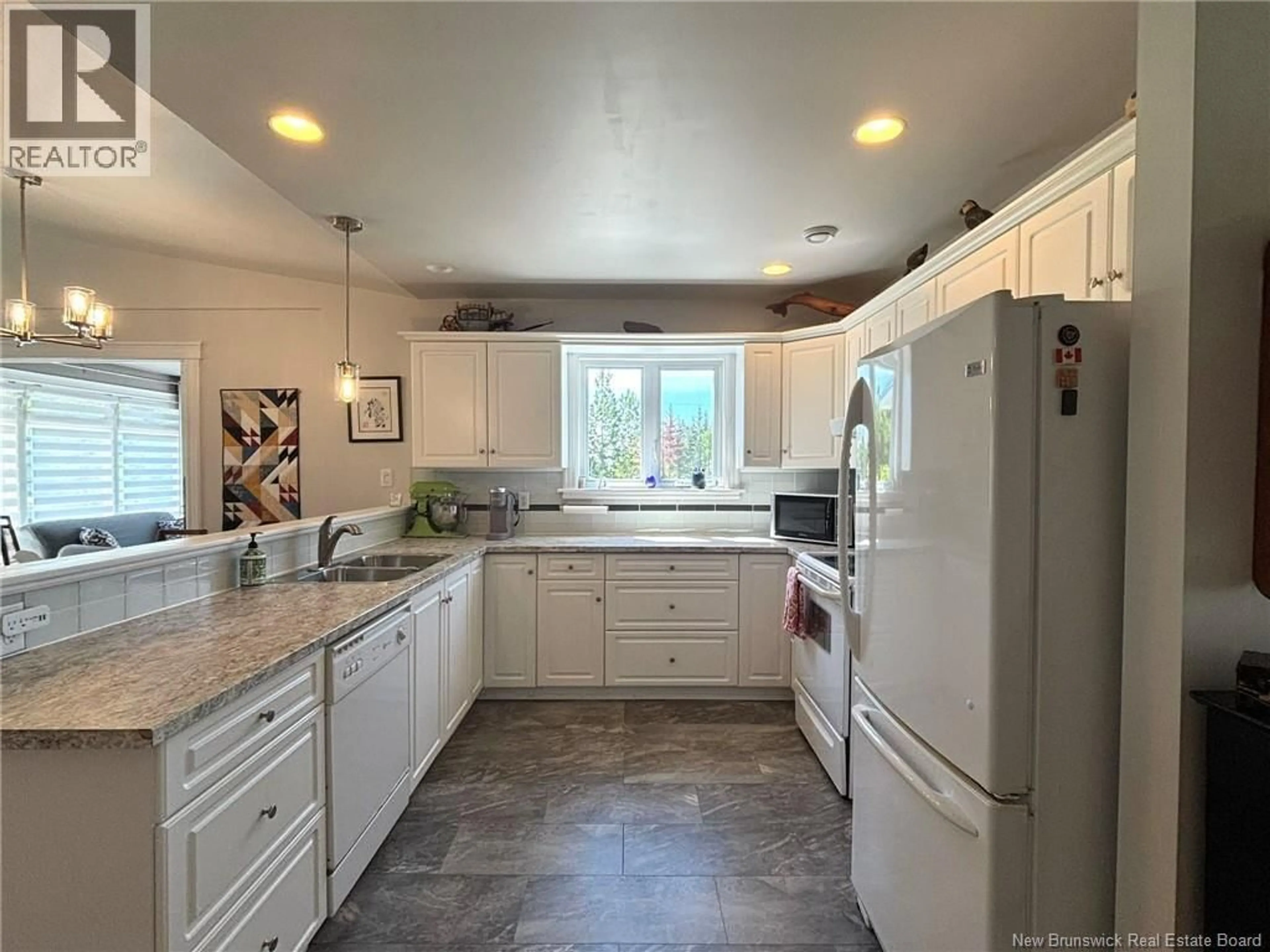Open concept kitchen, ceramic/tile floor for 1 - 13 RAGGED POINT ROAD, Grand Manan New Brunswick E5G2C1
