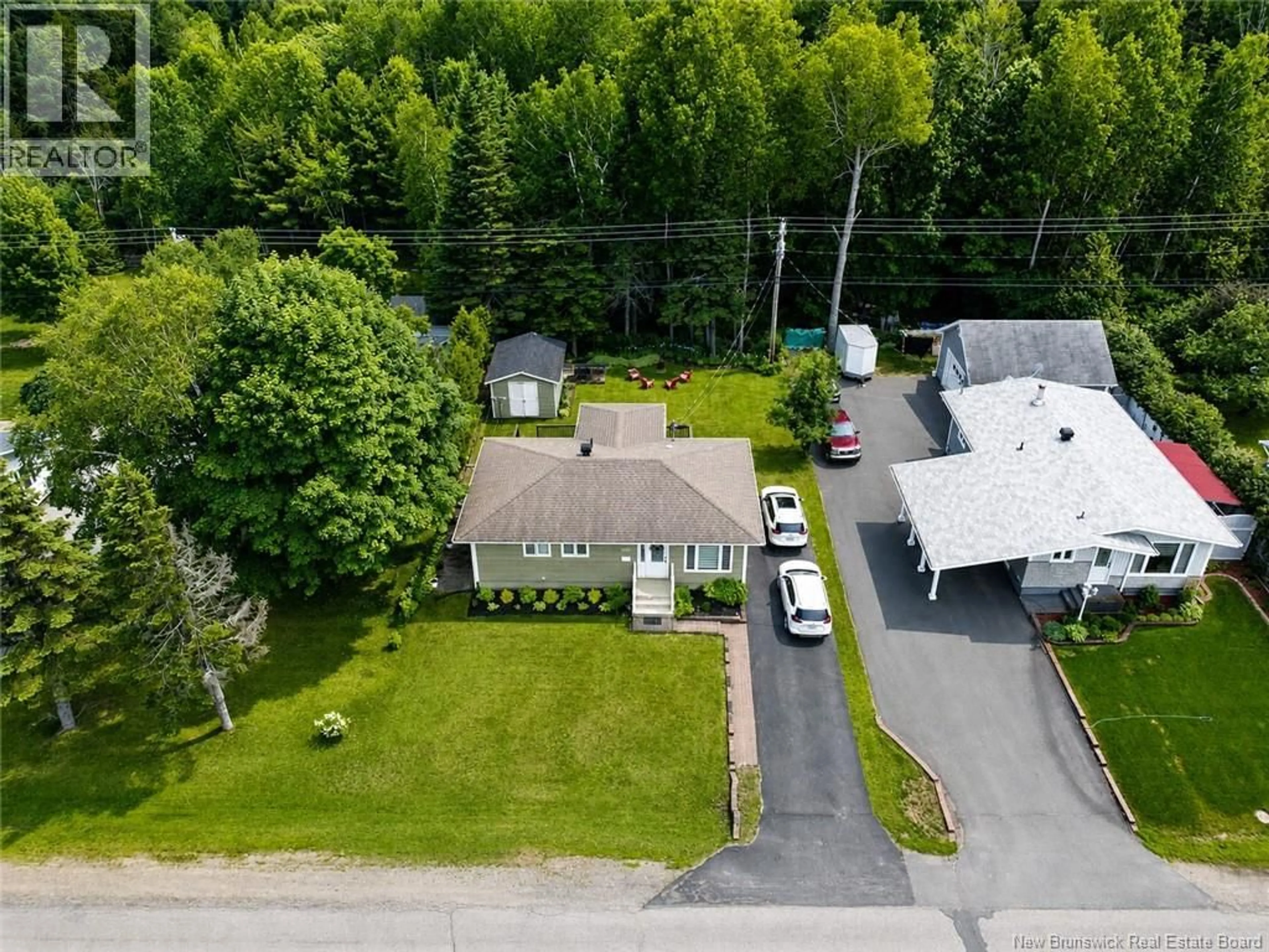 A pic from outside/outdoor area/front of a property/back of a property/a pic from drone, street for 1017 CENTENNIAL STREET, Bathurst New Brunswick E2A2W6