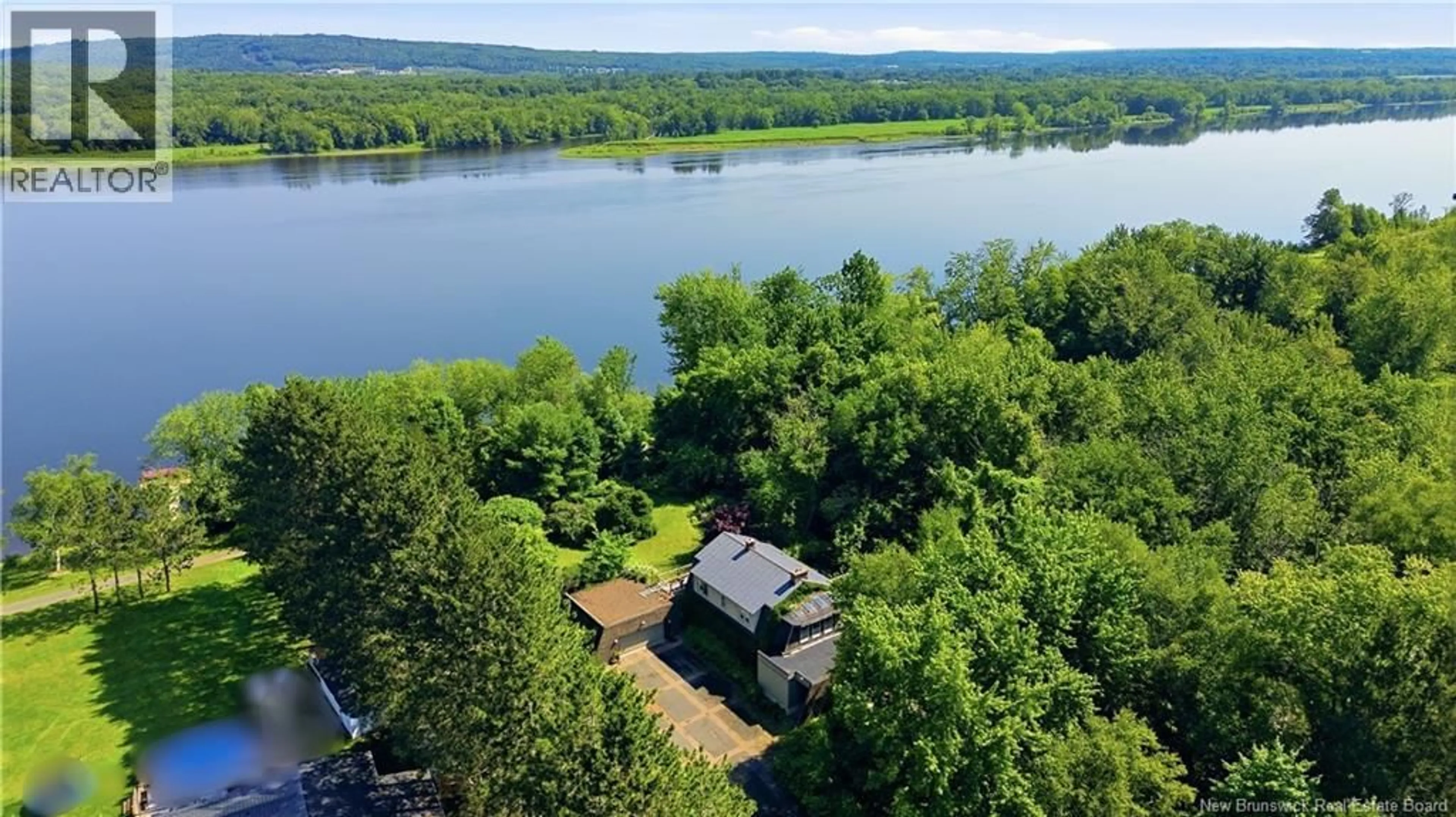 A pic from outside/outdoor area/front of a property/back of a property/a pic from drone, water/lake/river/ocean view for 1421 WOODSTOCK ROAD, Fredericton New Brunswick E3C1P2