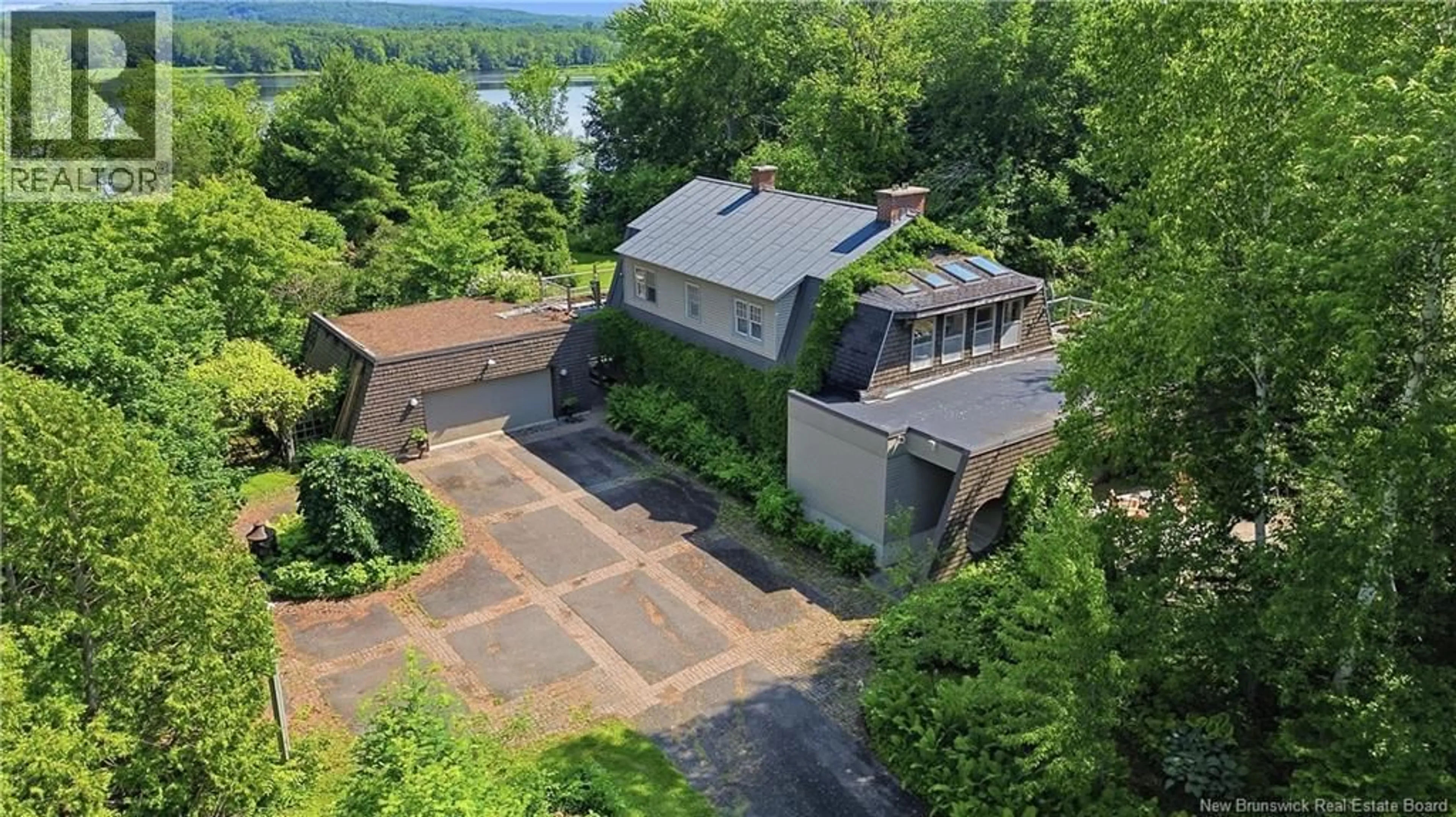 A pic from outside/outdoor area/front of a property/back of a property/a pic from drone, water/lake/river/ocean view for 1421 WOODSTOCK ROAD, Fredericton New Brunswick E3C1P2