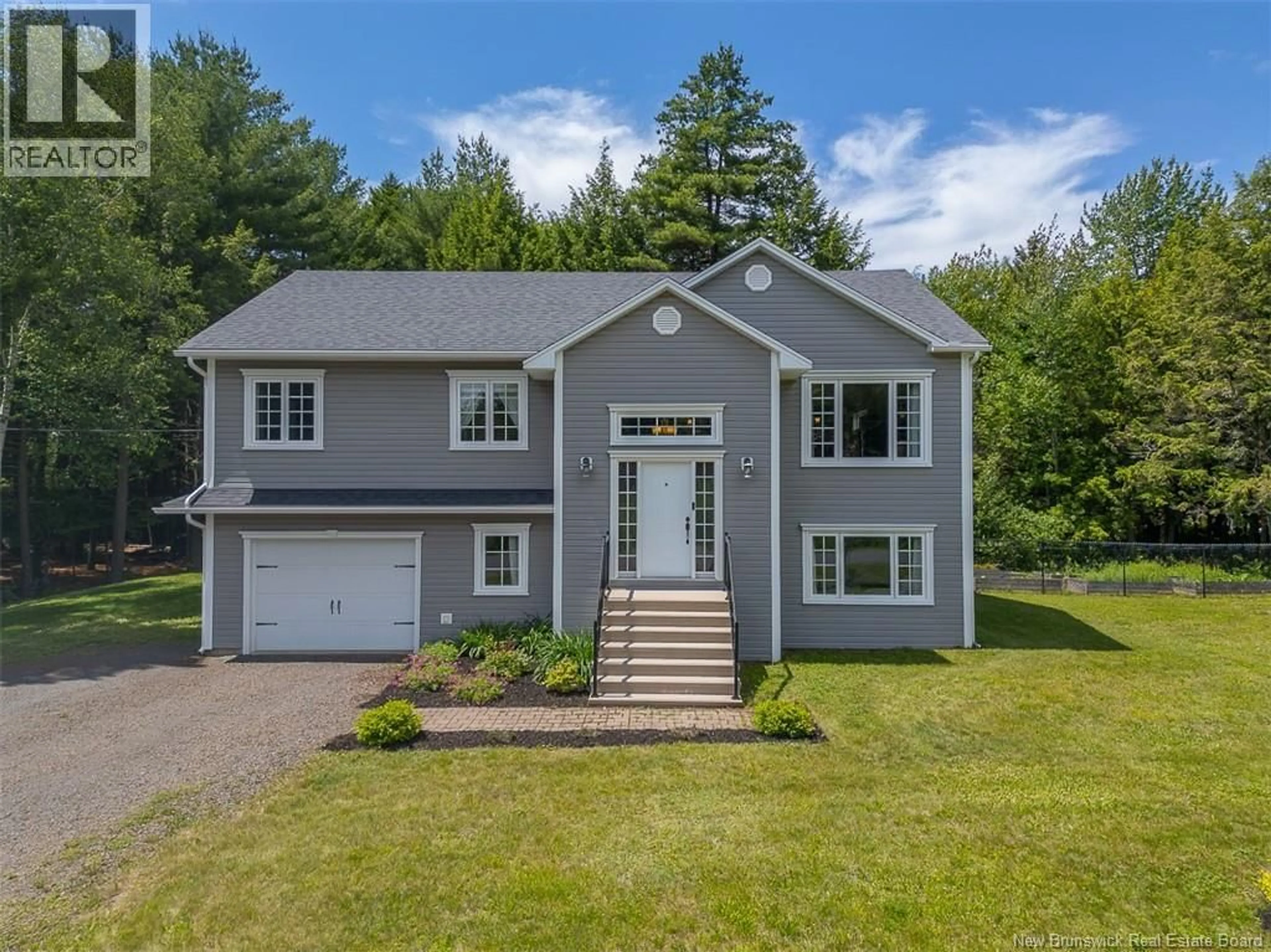 Home with vinyl exterior material, street for 76 BIDEN DRIVE, Richibucto Road New Brunswick E3A5V8