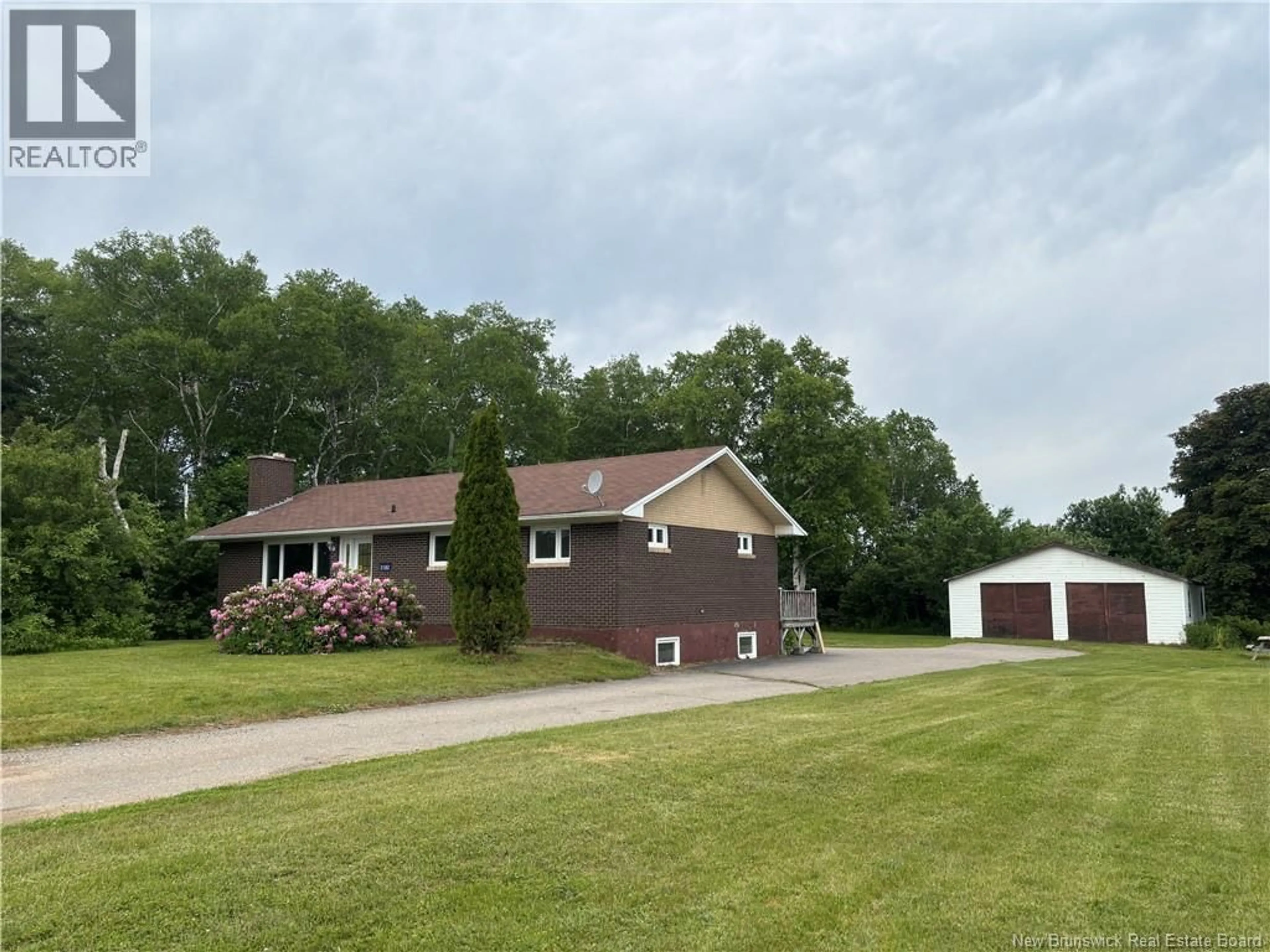 A pic from outside/outdoor area/front of a property/back of a property/a pic from drone, unknown for 2182 MAIN STREET, Belledune New Brunswick E8G2M4