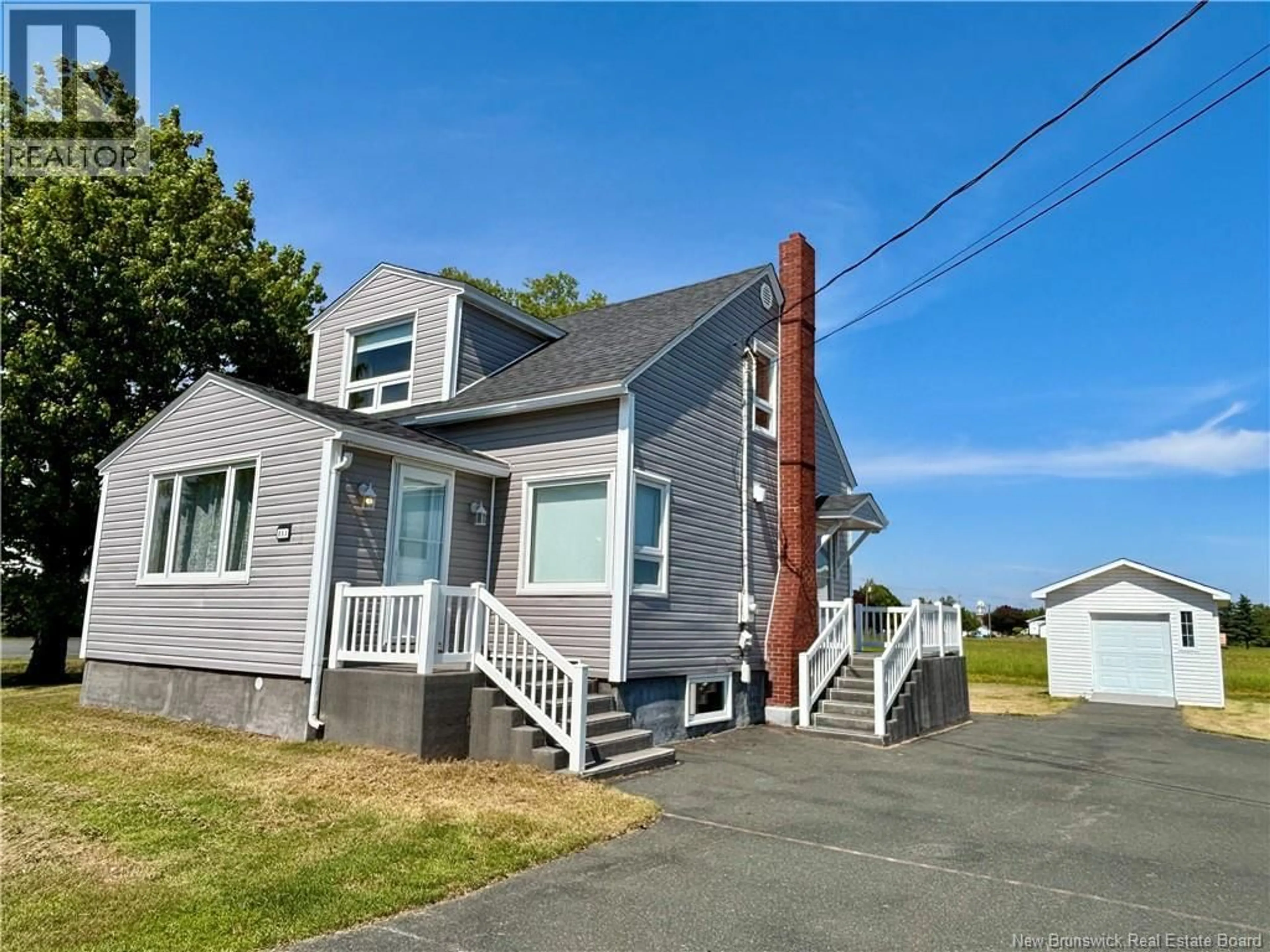 Home with vinyl exterior material, street for 853 ROUTE 113, Inkerman New Brunswick E8P1E6