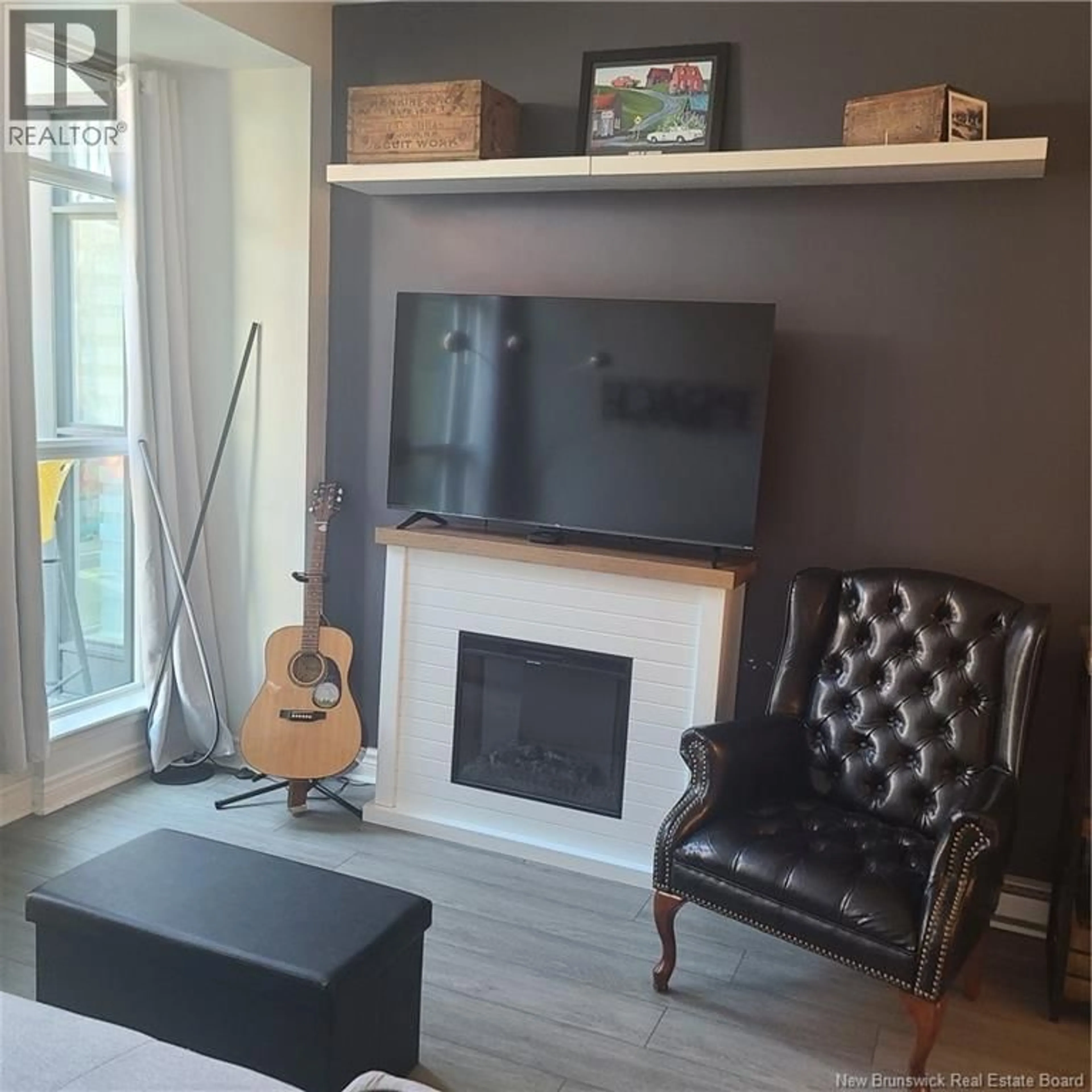 Living room with furniture, wood/laminate floor for 120 - 243 PRINCE WILLIAM STREET, Saint John New Brunswick E2L0C6