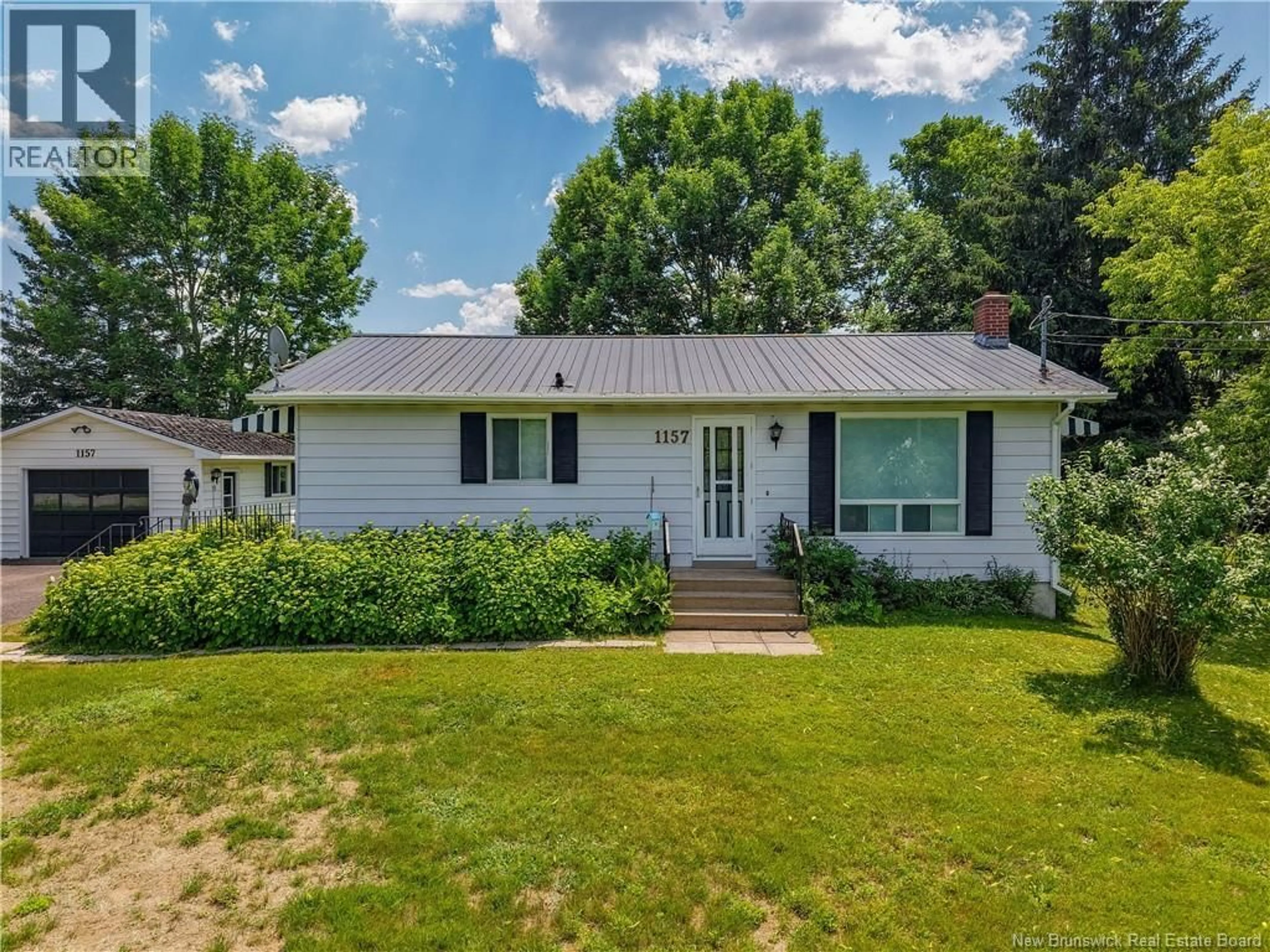 Home with vinyl exterior material, street for 1157 ROUTE 104, Burtts Corner New Brunswick E6L2G4