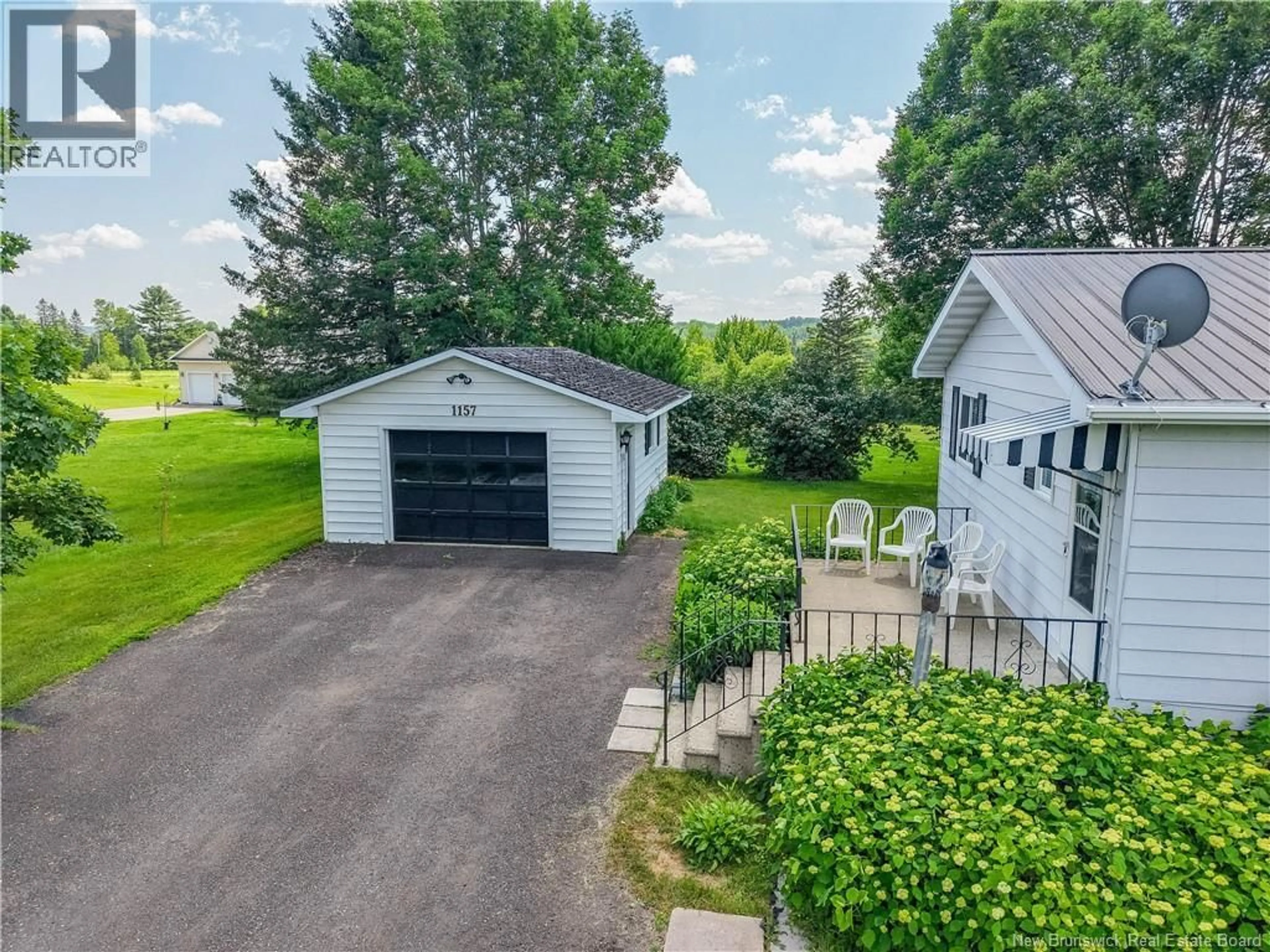 A pic from outside/outdoor area/front of a property/back of a property/a pic from drone, street for 1157 ROUTE 104, Burtts Corner New Brunswick E6L2G4