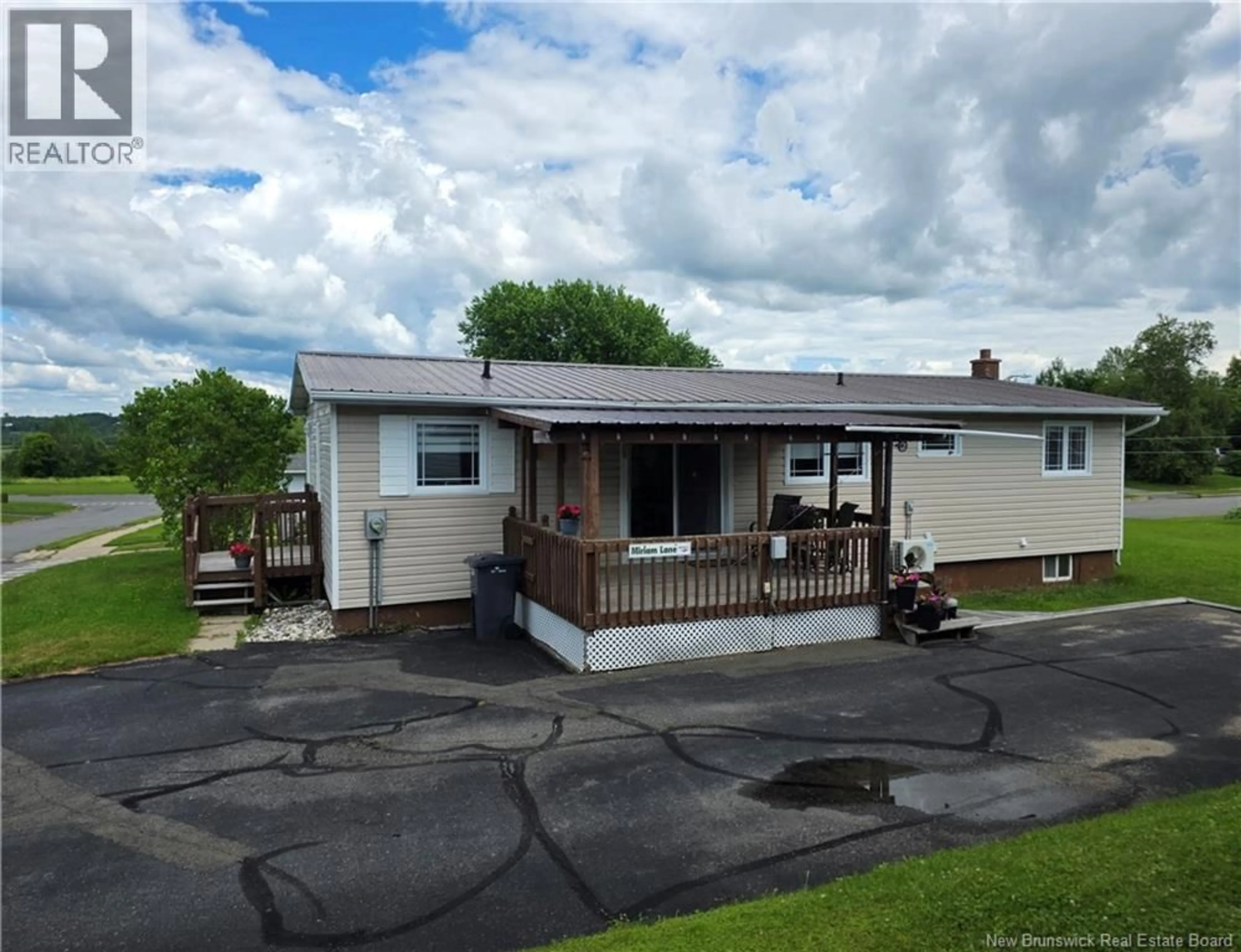 A pic from outside/outdoor area/front of a property/back of a property/a pic from drone, unknown for 16 HARDING DRIVE, Nackawic New Brunswick E6G1C4