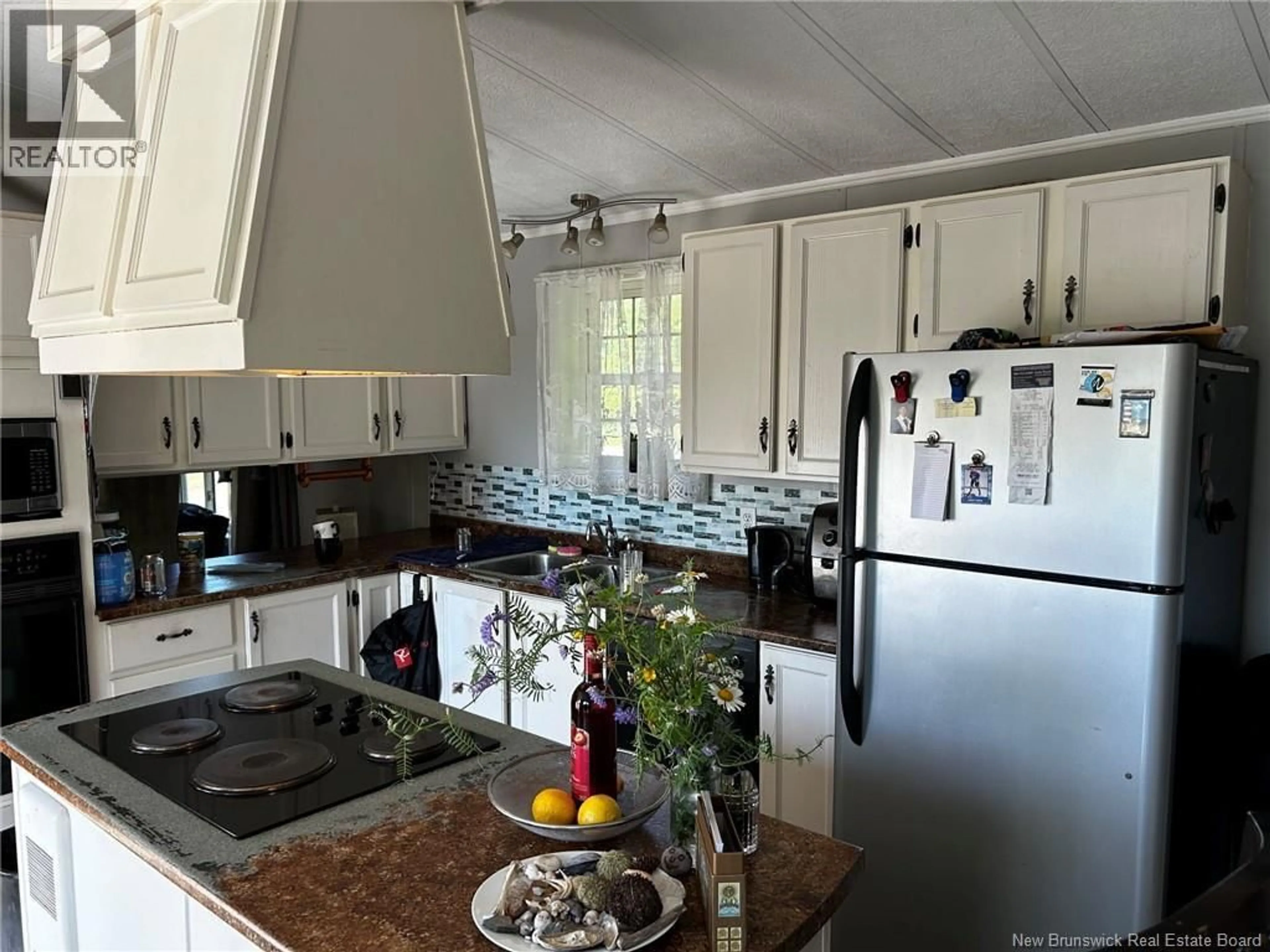 Open concept kitchen, ceramic/tile floor for 70 CANAL ROAD, Canal New Brunswick E5C1K1