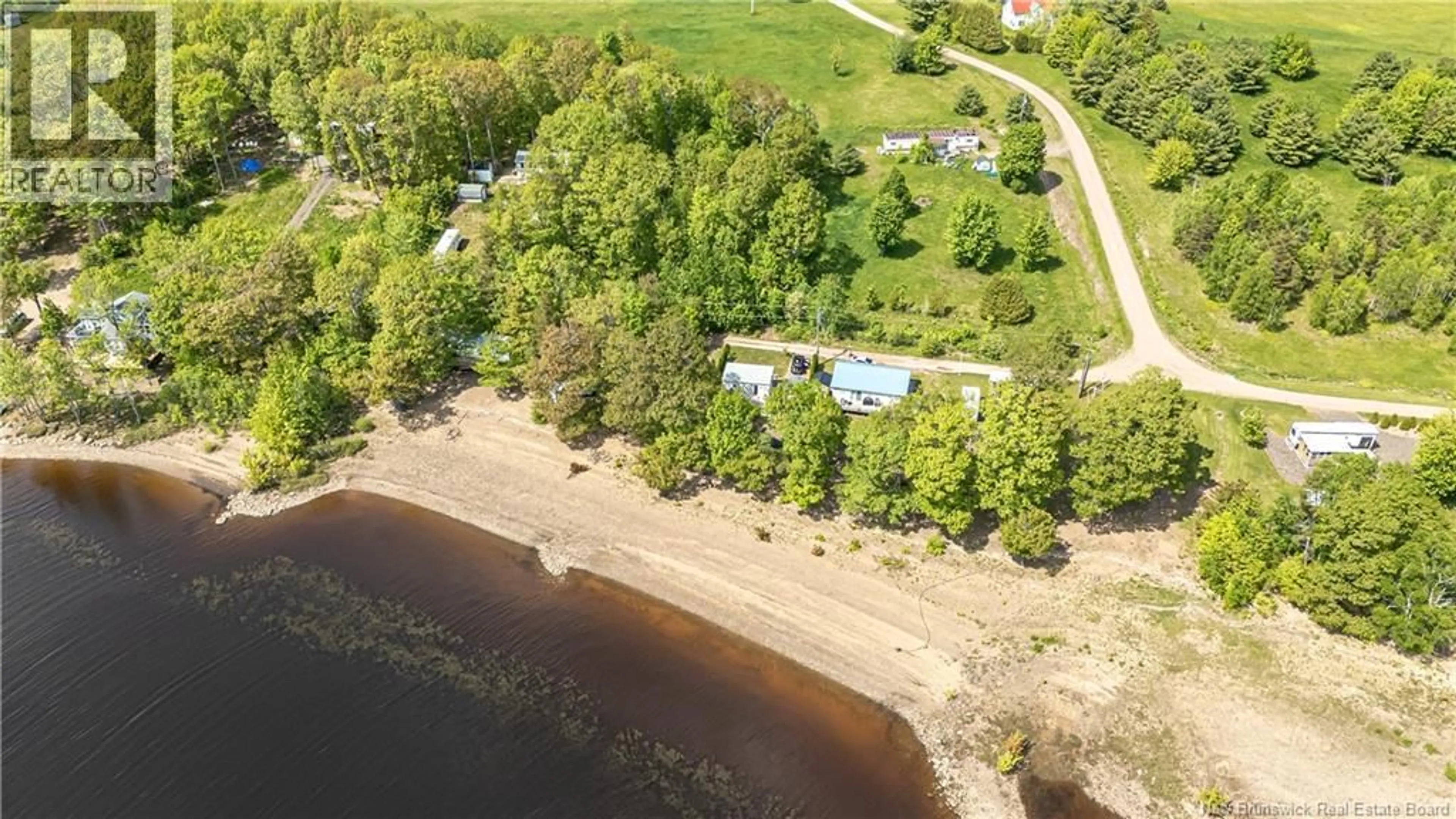 A pic from outside/outdoor area/front of a property/back of a property/a pic from drone, water/lake/river/ocean view for 47 WASHADEMOAK LANE, Cambridge-Narrows New Brunswick E4C4M5