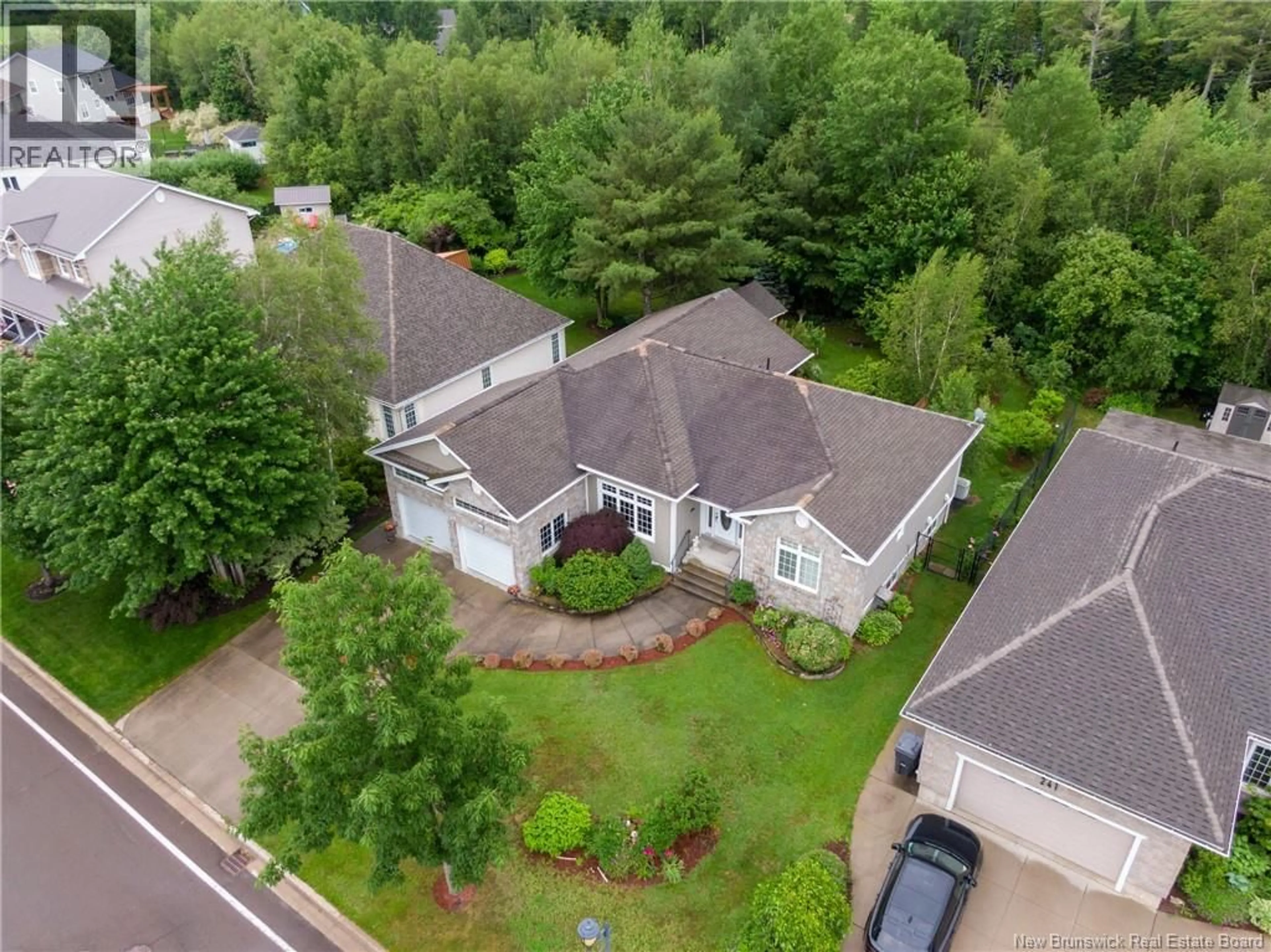 A pic from outside/outdoor area/front of a property/back of a property/a pic from drone, unknown for 235 SUMMERHILL ROW, Fredericton New Brunswick E3A0C5