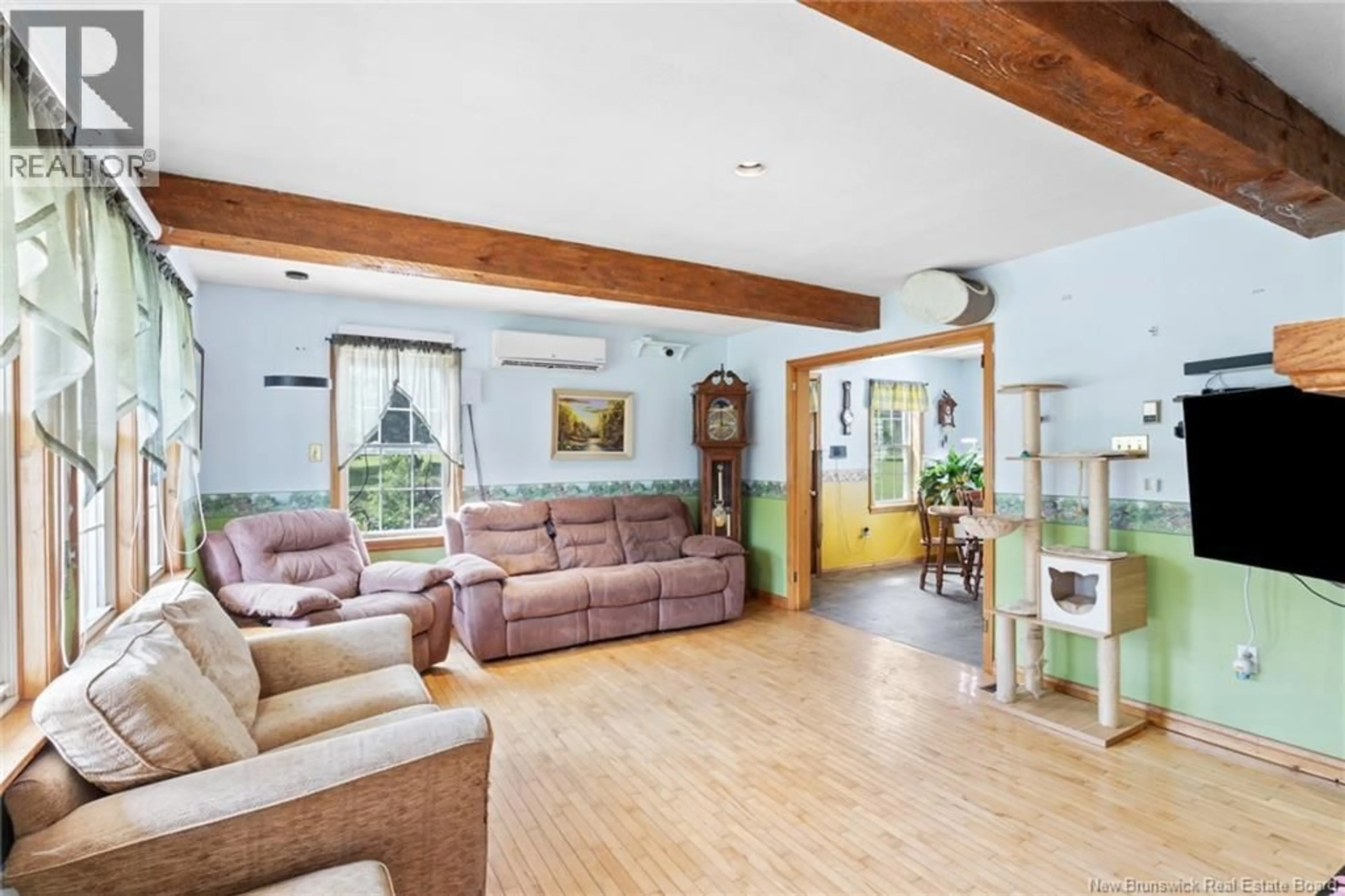 Living room with furniture, wood/laminate floor for 164 GORE ROAD, Fredericton Junction New Brunswick E5L1T9